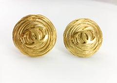 1988 Chanel Large Gold-Plated Textured Round Logo Earrings