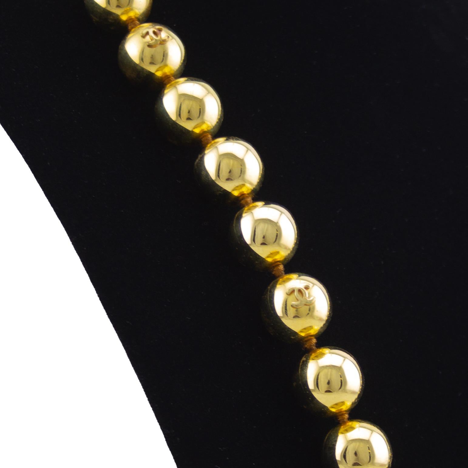 Women's or Men's 1988 Collection 27 Chanel Jumbo Gold Ball Long Necklace For Sale