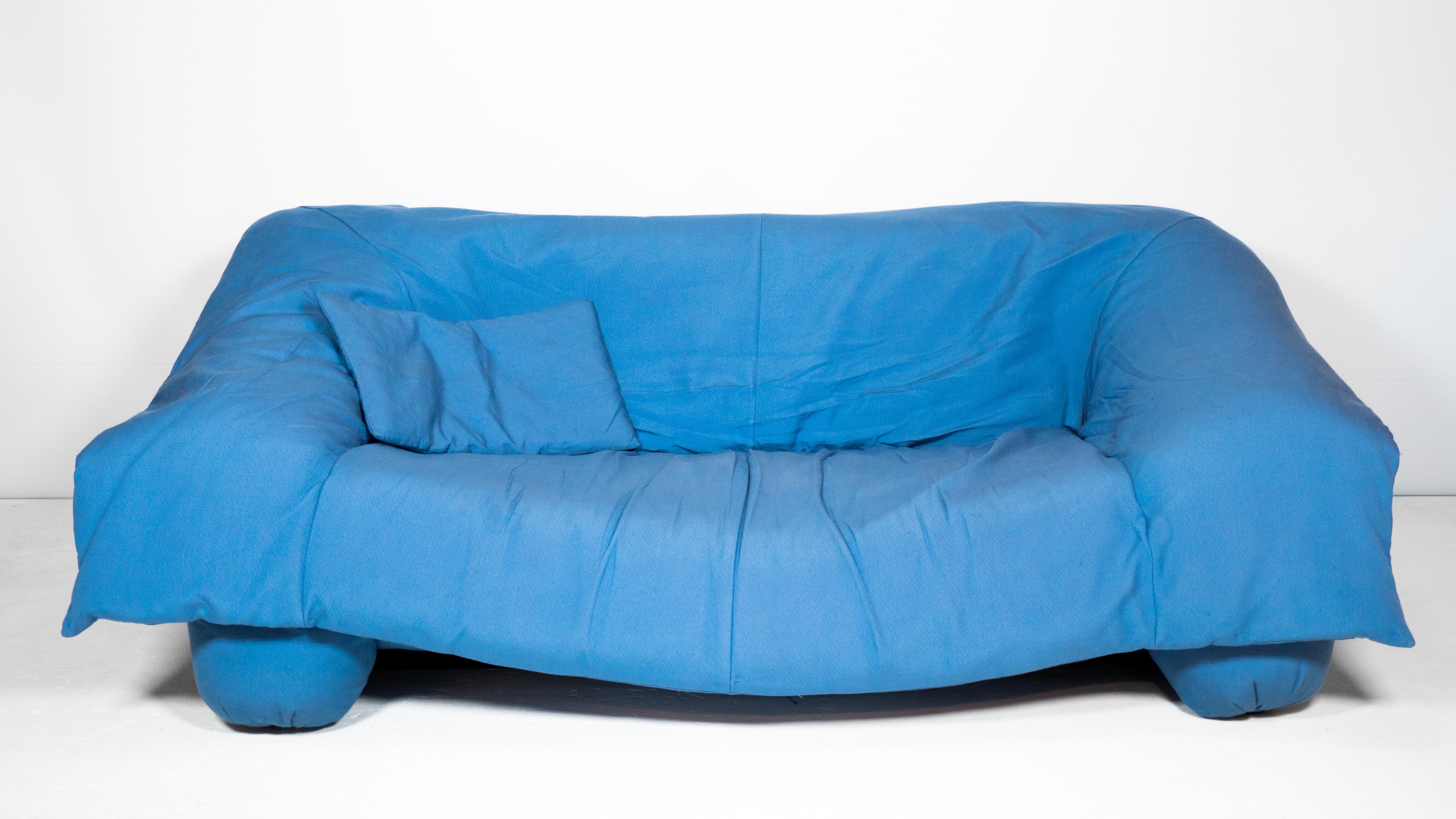 Flou Flou' sofa designed by renowned Italian trio Jonathan De Pas, Donato D’Urbino and Paolo Lomazzi, for Ligne Roset, circa 1988. Wrapped in original soft blue upholstery with matching pillow. Delightfully playful design that creates a soft,