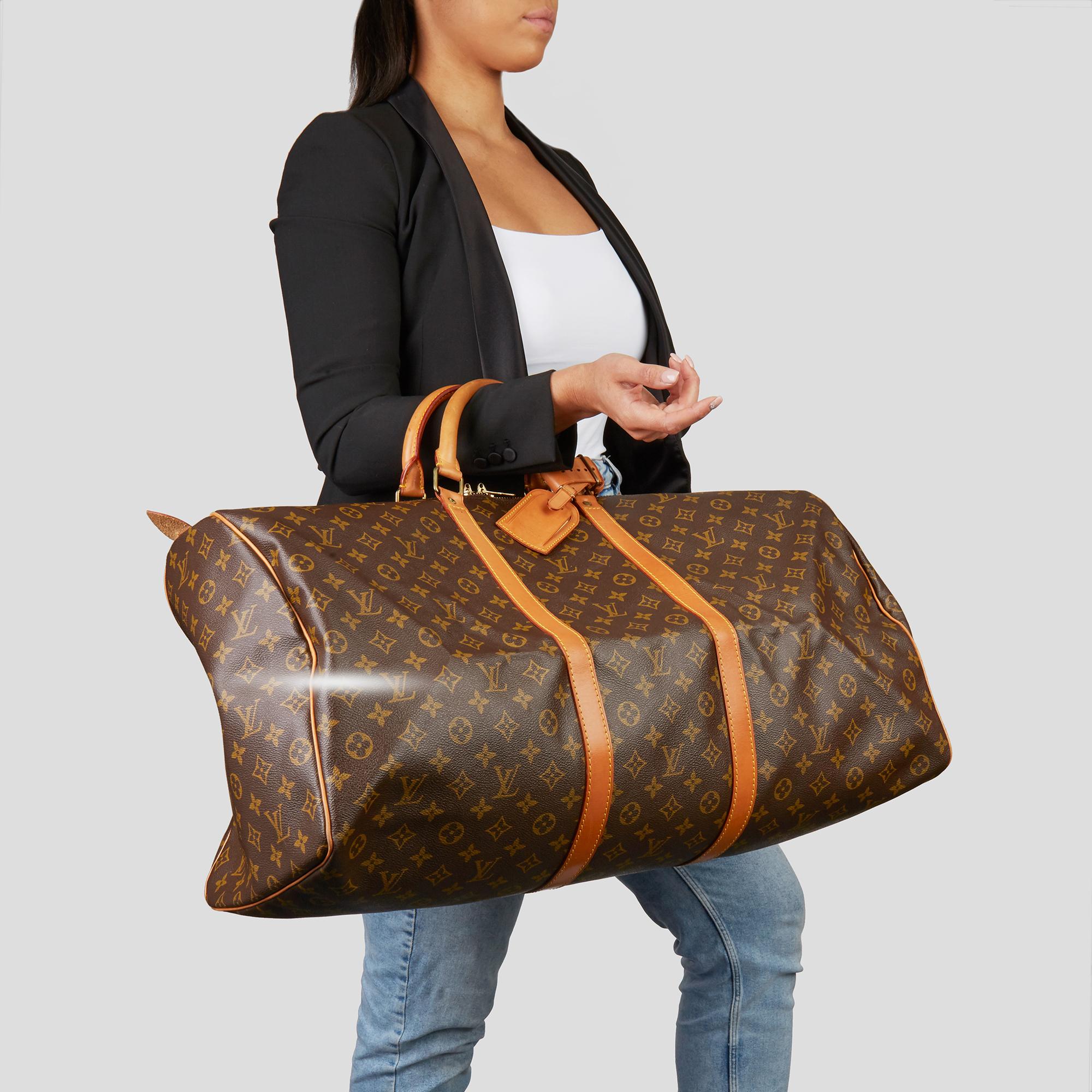 LOUIS VUITTON
Brown Monogram Coated Canvas & Vachetta Leather Vintage Keepall 60

Xupes Reference: HB3491
Serial Number: MI881
Age (Circa): 1988
Accompanied By: Luggage Tag
Authenticity Details: Date Stamp (Made in France) 
Gender: Unisex
Type: