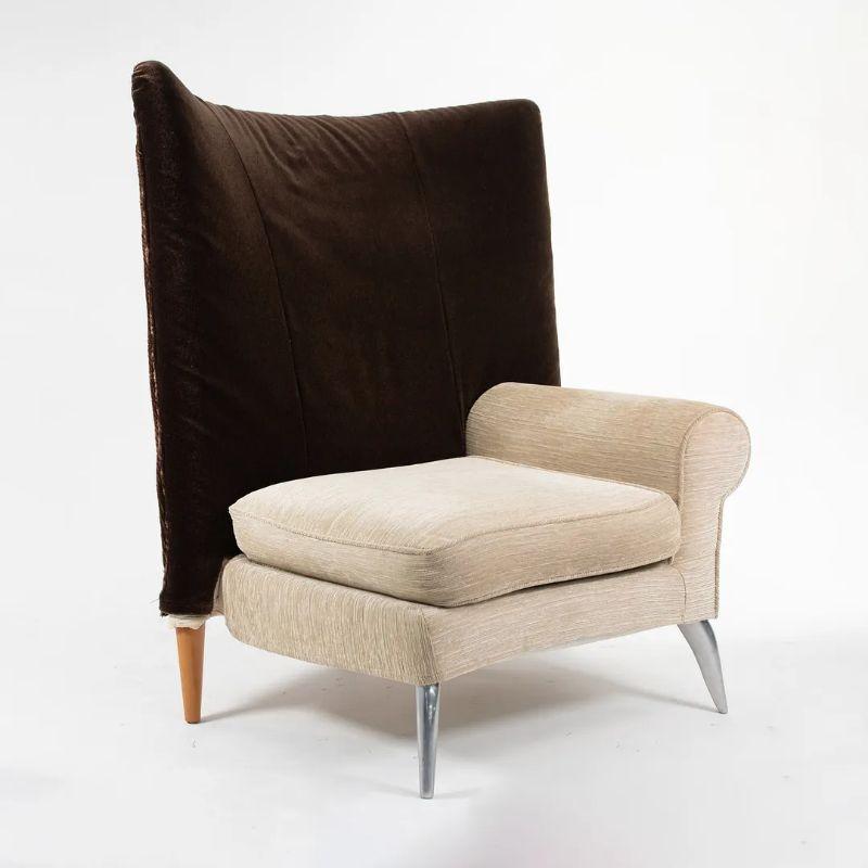 This is a pair of Royalton Armchairs, designed by Philippe Starck, and produced by Driade shortly after the design's introduction in 1988. In the late 1980s, Starck was approached by hotelier Ian Schraeger to design a line of furniture for a new
