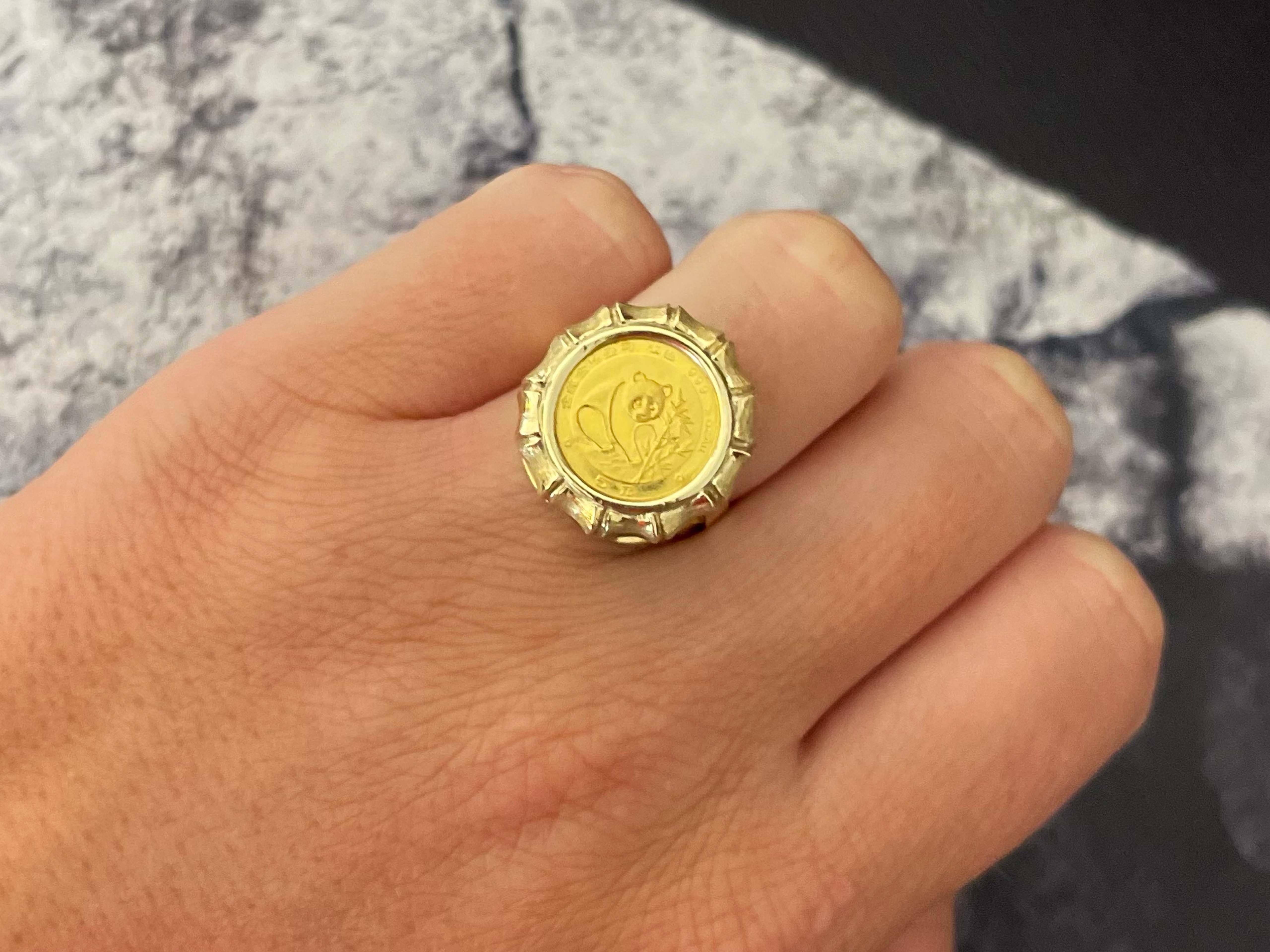 Ring Specifications:
​
​Metal: 14K Yellow Gold

Ring Size: 6.75

Total Weight: 6.4 Grams 

Gold Coin: 1/20 oz 24k

Gold Coin Purity: 99.99%

Condition: Preowned