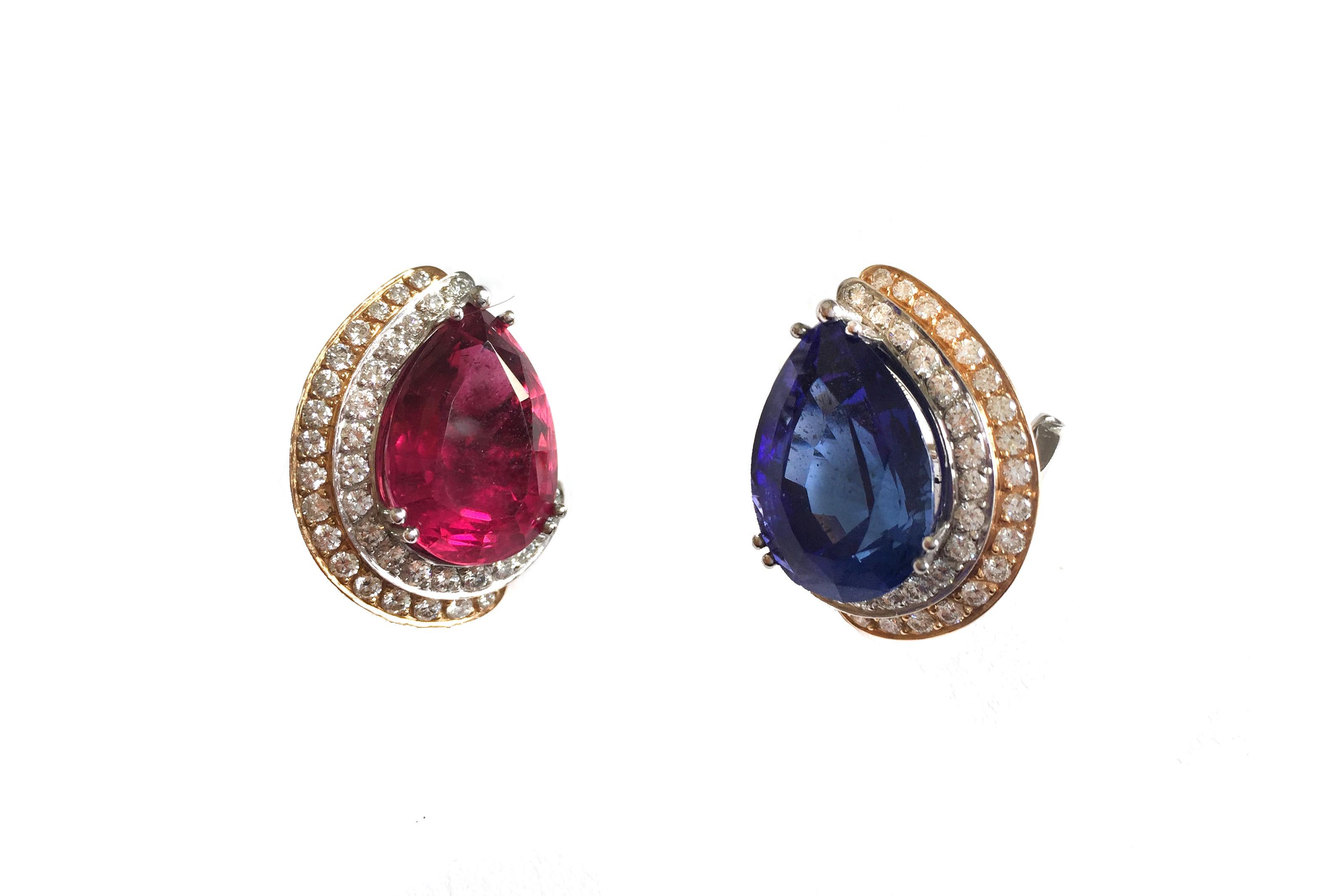 A pair of rubellite, tanzanite, diamond, and 18 karat yellow and rose gold earclips, by Paul Binder, 1988.

The earrings measure .6