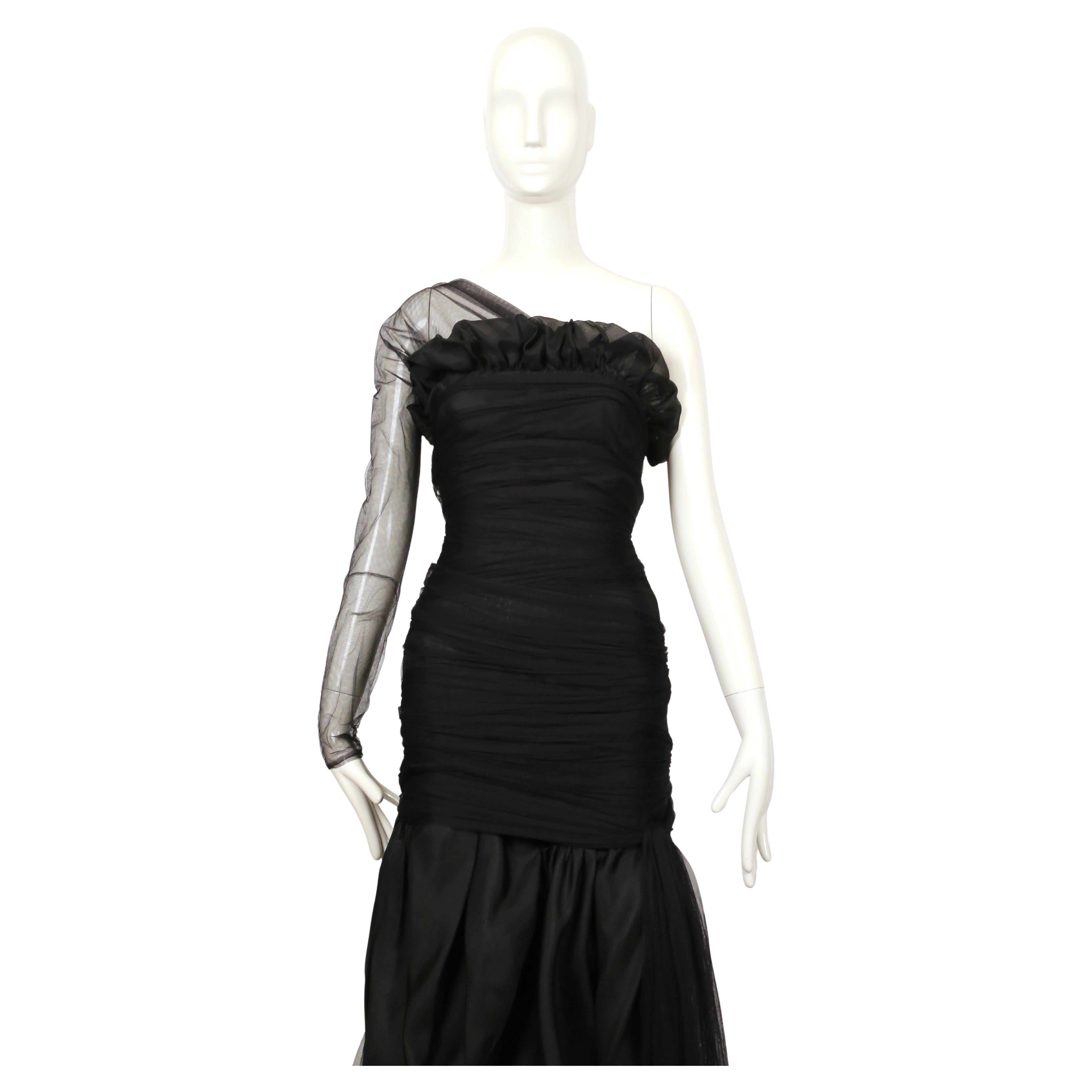 Stunning, jet-black silk dress with long tulle wrap ties and asymmetrical top designed by Romeo Gigli dating to 1988. Similar  piece photographed by Paolo Roversi on Kirsten Owen. Dress is labeled an Italian size 42.  Approximate measurements for