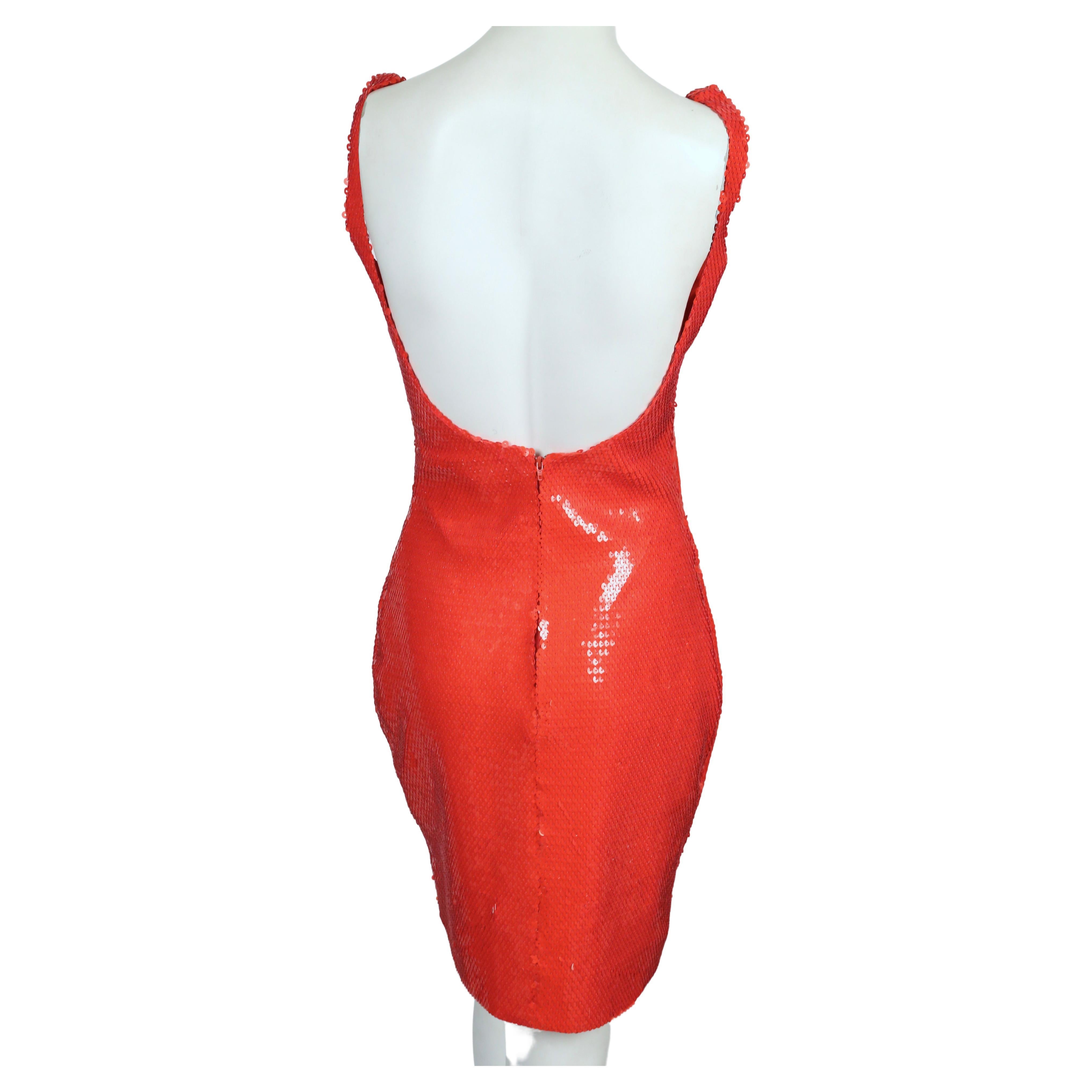 Very rare, red sequined dress from Stephen Sprouse dating to spring of 1988. Labeled a US size 6. Approximate measurements: bust 32
