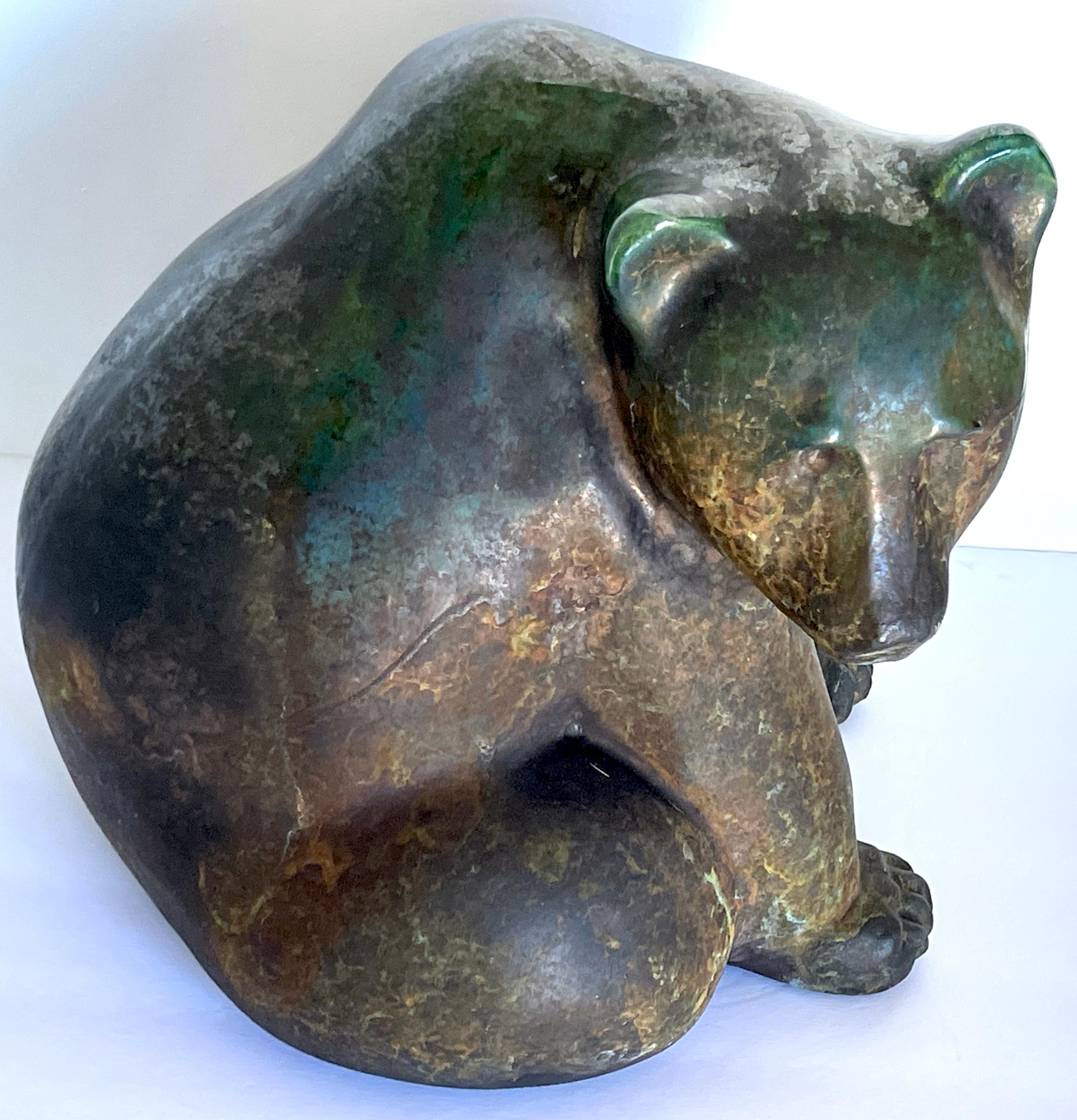1988 Tony Evans Raku Big Bear Sculpture 
Signed 'Evans,88'
A remarkable 1988 The Tony Evans Raku Big Bear Sculpture is an exquisite piece of artistry. Crafted in Raku pottery, this large seated bear sculpture highlights Tony Evans' mastery of colors