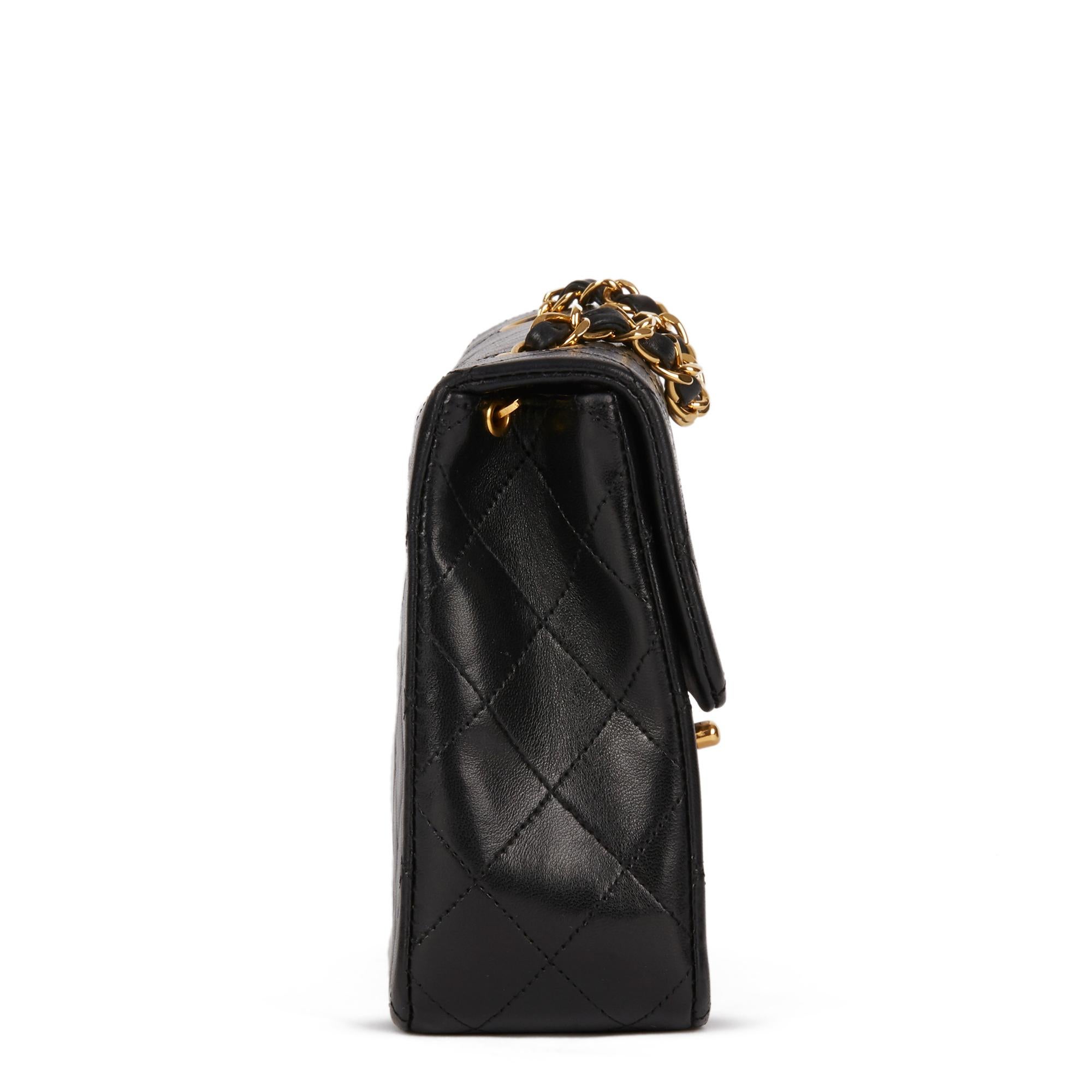 CHANEL
Black Quilted Lambskin Vintage Mini Flap Bag

Xupes Reference: HB2934
Serial Number: 1361591
Age (Circa): 1989
Accompanied By: Chanel Dust Bag, Box
Authenticity Details: Serial Sticker (Made in France)
Gender: Ladies
Type: Shoulder,