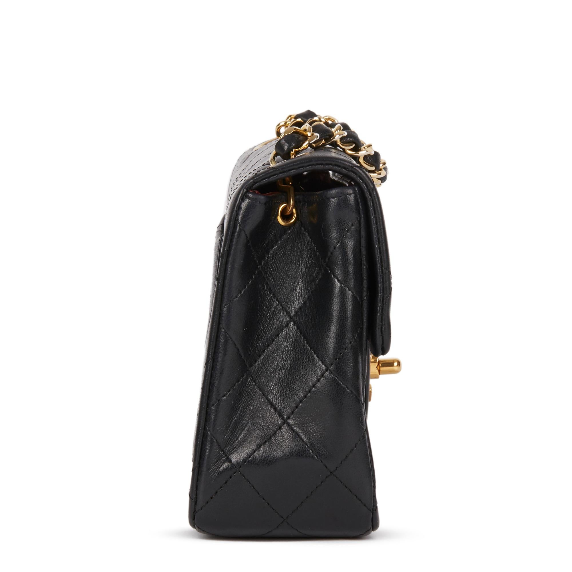 CHANEL
Black Quilted Lambskin Vintage Mini Flap Bag

Xupes Reference: HB2942
Serial Number: 1167782
Age (Circa): 1989
Accompanied By: Chanel Dust Bag, Box
Authenticity Details: Serial Sticker (Made in France)
Gender: Ladies
Type: Shoulder,