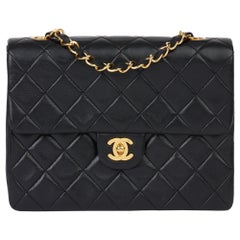 1989 Chanel Black Quilted Lambskin Vintage Mini Flap Bag 