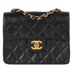 1989 Chanel schwarz gesteppte Lammfell Vintage Mini Flap Bag