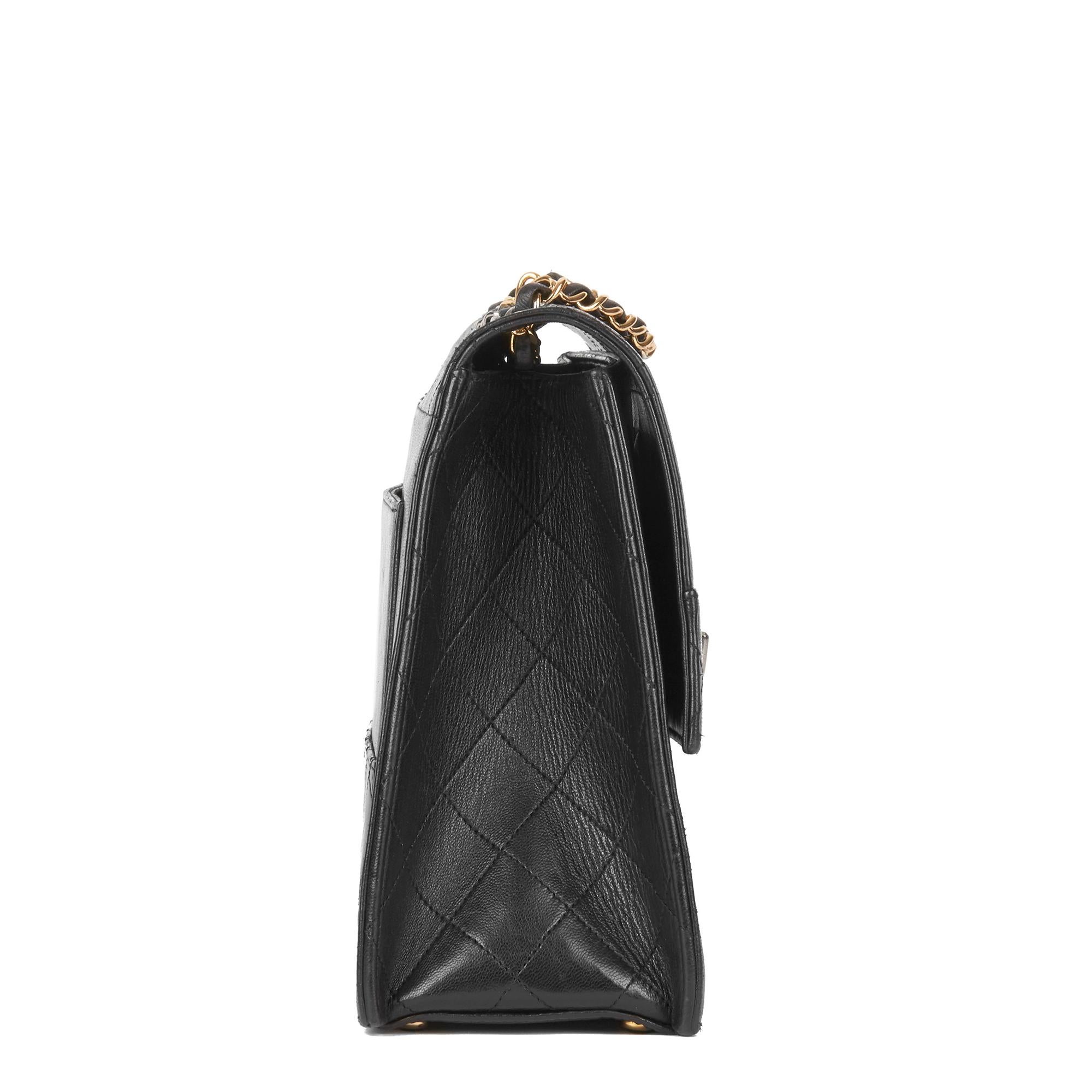 CHANEL
Black Quilted Lambskin Vintage Trapeze Classic Single Flap Bag with Wallet

Xupes Reference: HB2945
Serial Number: 1654897
Age (Circa): 1989
Accompanied By: Authenticity Card, Interior Wallet
Authenticity Details: Serial Sticker, Authenticity
