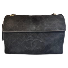 1989 Chanel Black suede shoulder bag