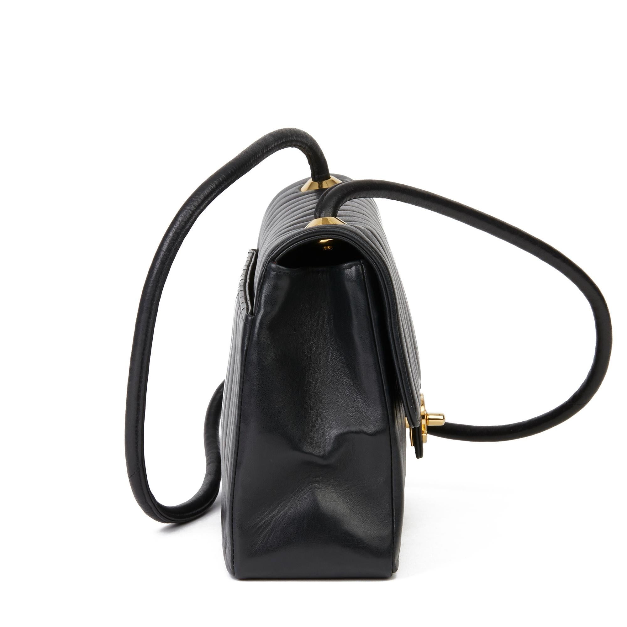 CHANEL 
Black Vertical Quilted Lambskin Vintage Classic Single Flap Bag 

Xupes Reference: HB2804
Serial Number: 1899404
Age (Circa): 1989
Accompanied By: Chanel Dust Bag, Authenticity Card
Authenticity Details: Authenticity Card, Serial Sticker