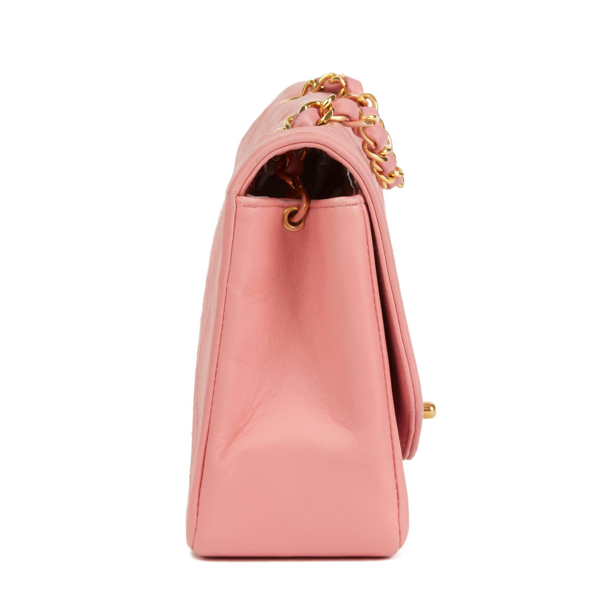CHANEL
Pink Quilted Lambskin Vintage Small Diana Classic Single Flap Bag

Reference: HB2288
Serial Number: 1708492
Age (Circa): 1989
Accompanied By: Chanel Dust Bag 
Authenticity Details: Serial Sticker (Made in France) 
Gender: Ladies
Type: