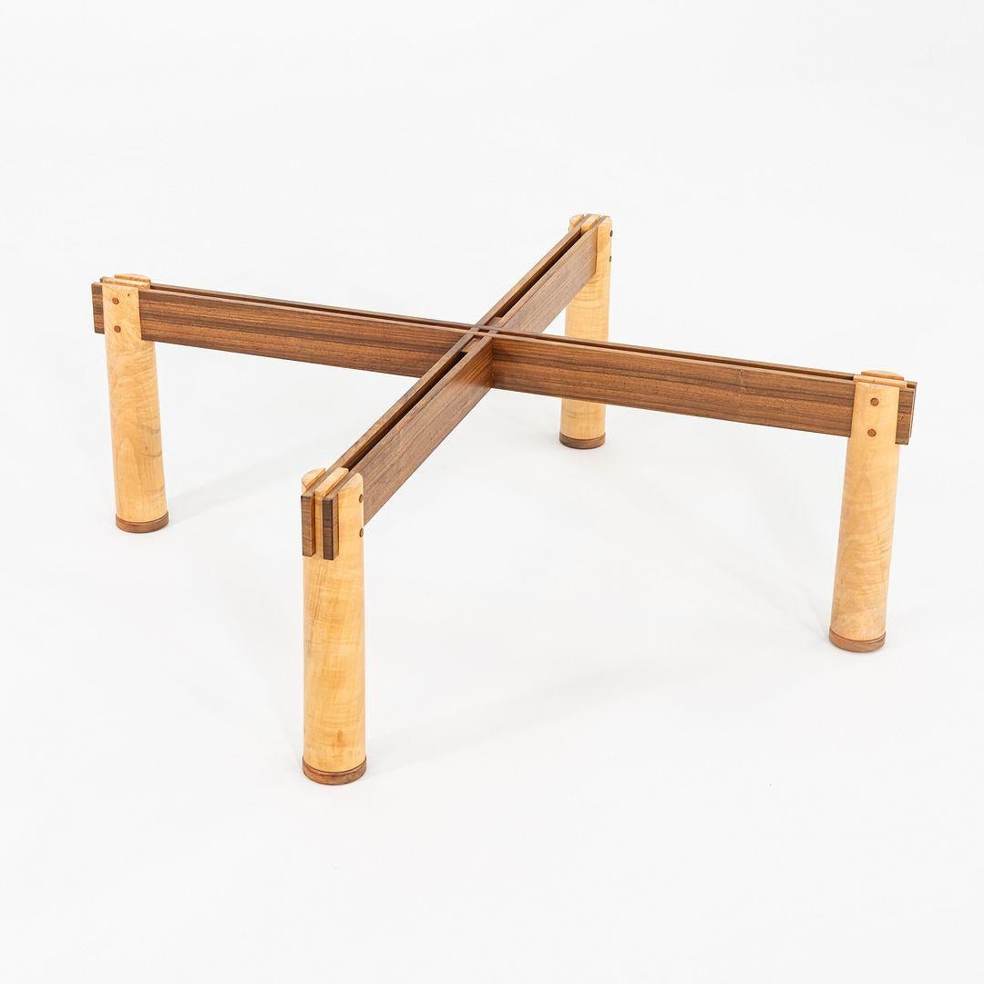This is a Studio-Crafted Wood and Glass Coffee Table, produced by Christopher Weiland at Weiland Willams Wood Works in the USA in 1989. Mr. Weiland is a well-known Master Artist, and has written books on different woodworking techniques. This table