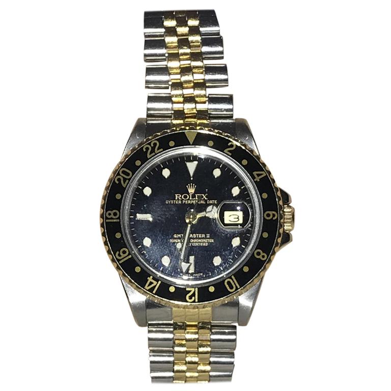 Montre-bracelet Rolex GMT Master II bi métallisée or et acier, boîte et papiers d'origine, 1989 en vente