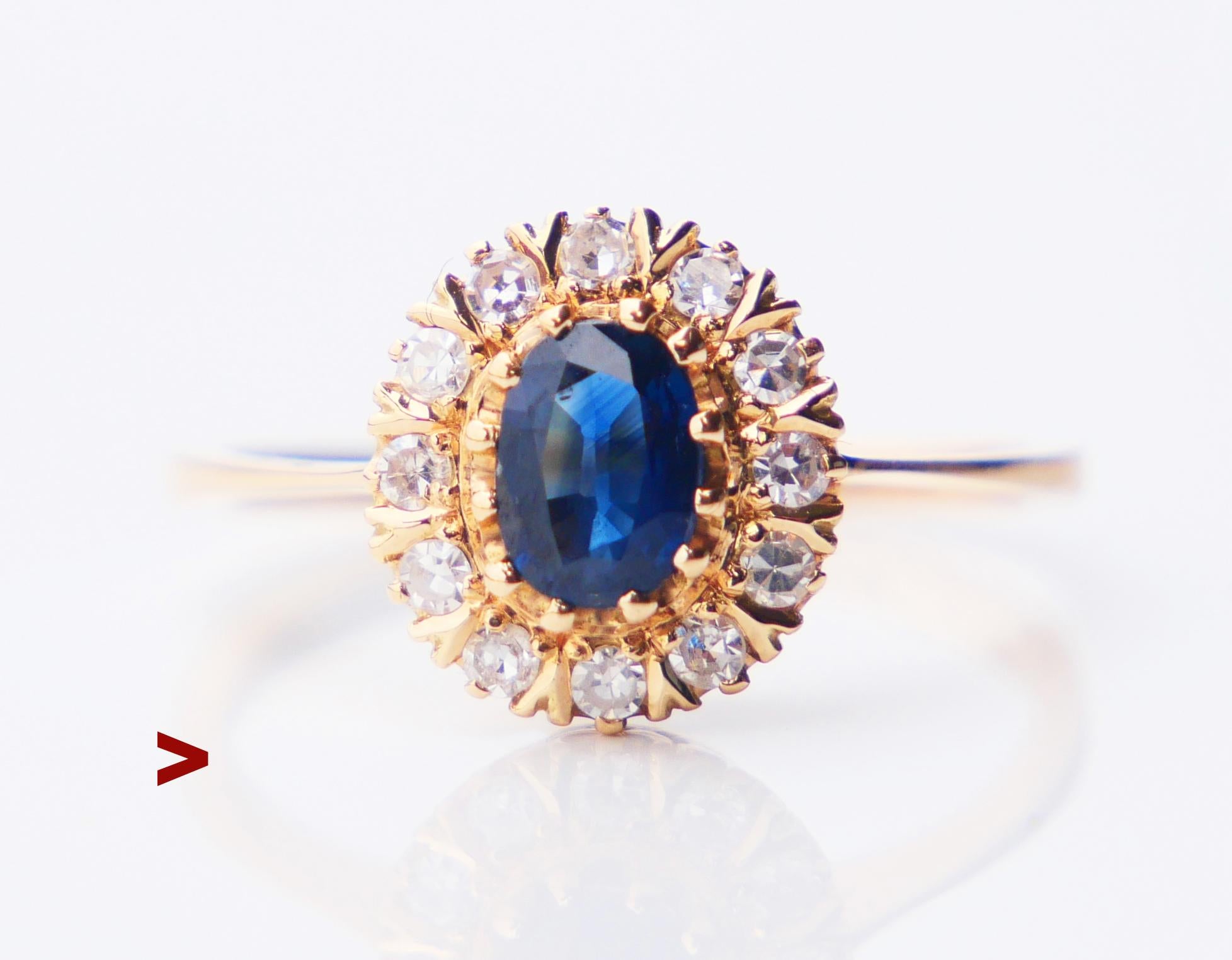 Beautiful Halo Ring in solid 18K Yellow Gold with natural Blue Sapphire and 12 Diamonds.

Swedish hallmarks, 18K, maker initials. Year combination P10 / made in 1989.

Floret / crown measures 10.5 mm x 9.5 mm x 6.7 mm deep.
Natural Blue Sapphire