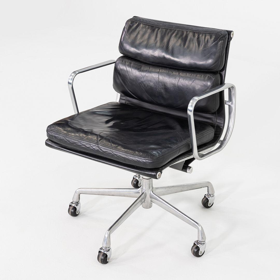 This is an Eames Aluminum Group Soft Pad Management Desk Chair, Model EA435, originally designed by Charles and Ray Eames for Herman Miller in 1969. These examples date to the year 1989 and came from the headquarters of American Institute of