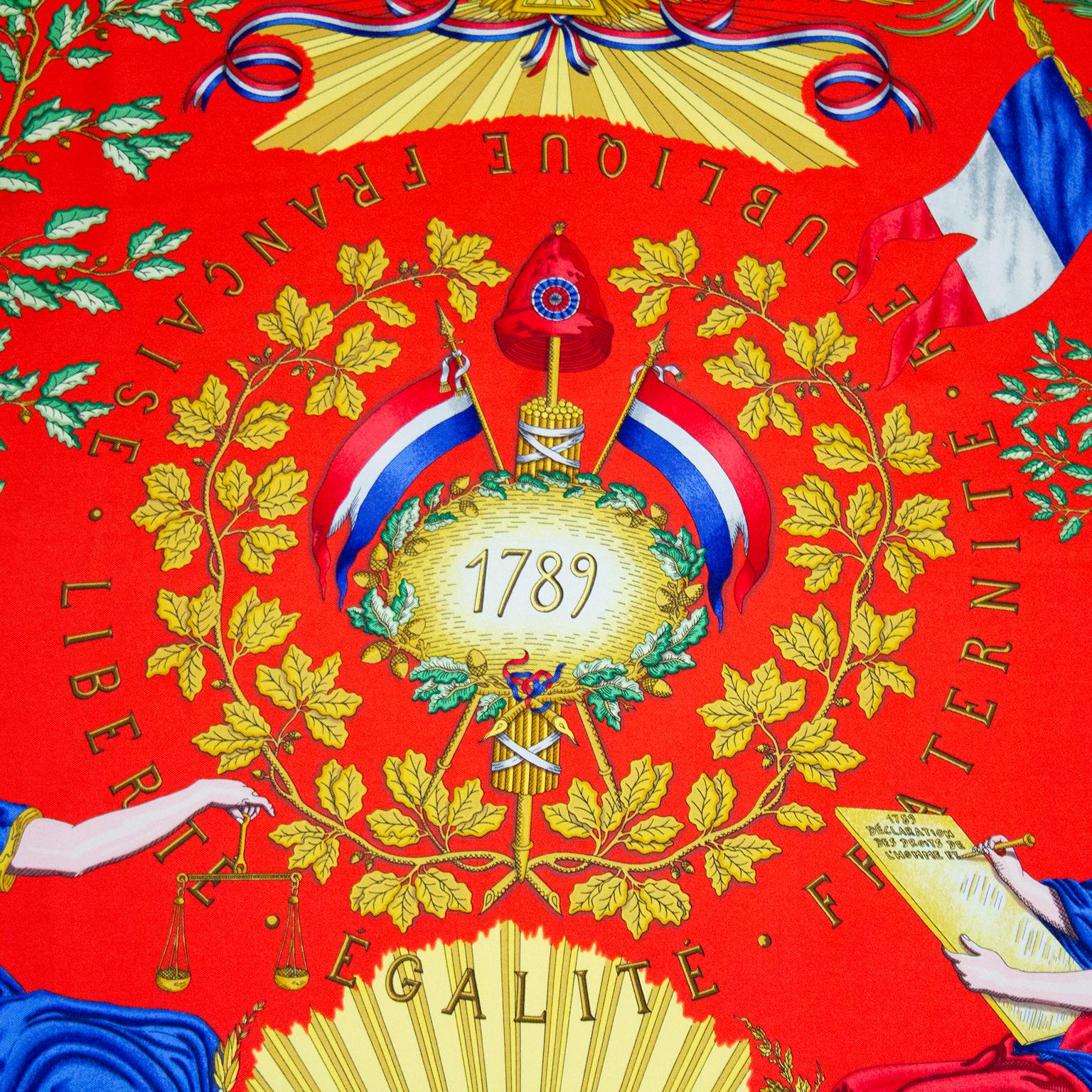 Hermes 'Republique Francaise Liberte Egalite Fraternite' silk scarf. This dramatic scarf was first issued in 1989 at the 200-year anniversary of France as a republic. This design is by Joachim Metz, and celebrates France becoming a Republic. Bold