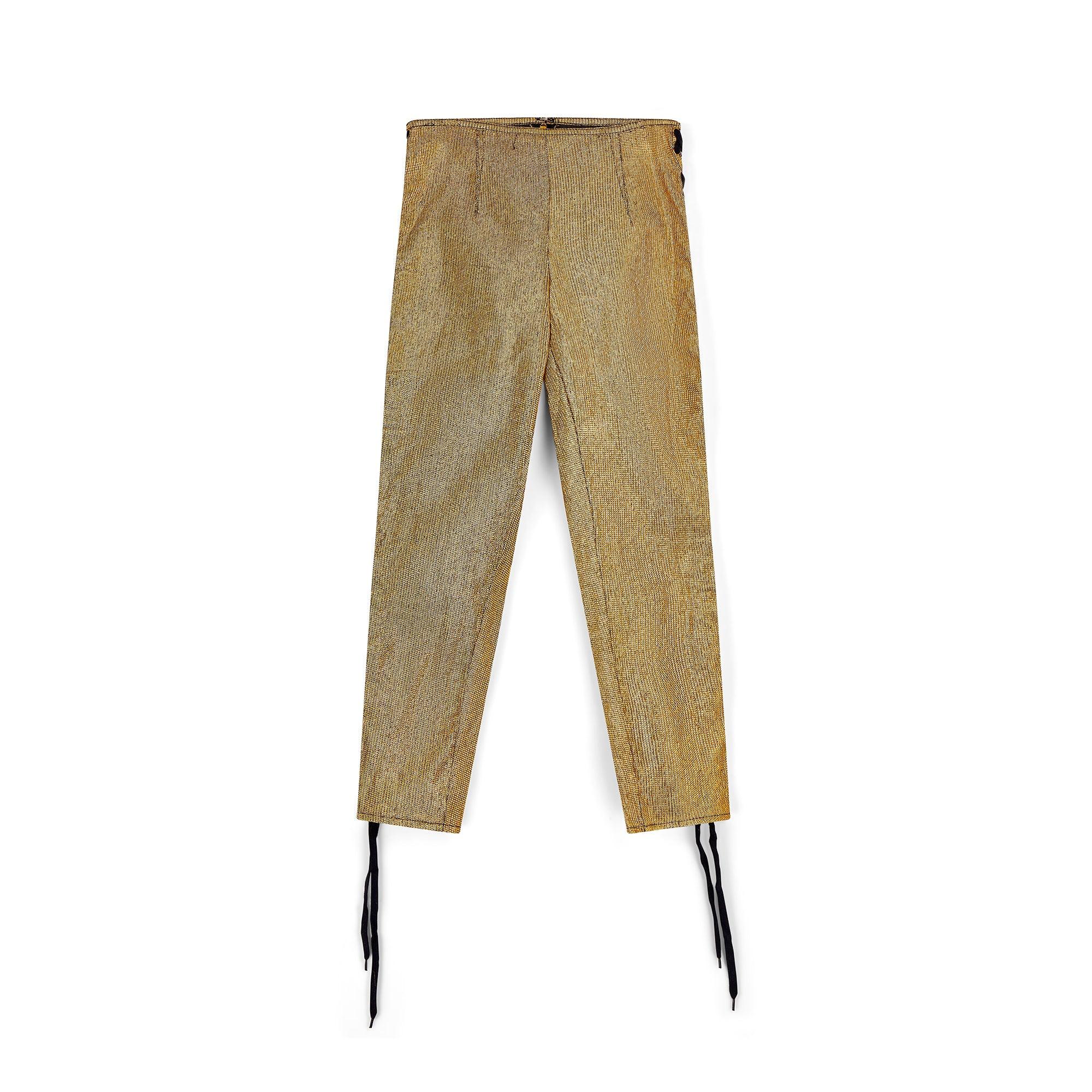 Diese prächtige Metallic-Hose von Jean Paul Gaultier aus den späten 1980er Jahren ist ein seltener Fund und in praktisch ungetragenem Zustand. Ein sehr gut dokumentierter Entwurf der Frühjahrskollektion 1989 des französischen Kultdesigners, der für
