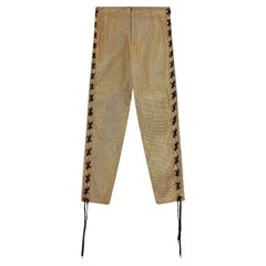 1989 Junior Gaultier Pantaloni in pizzo laminato oro