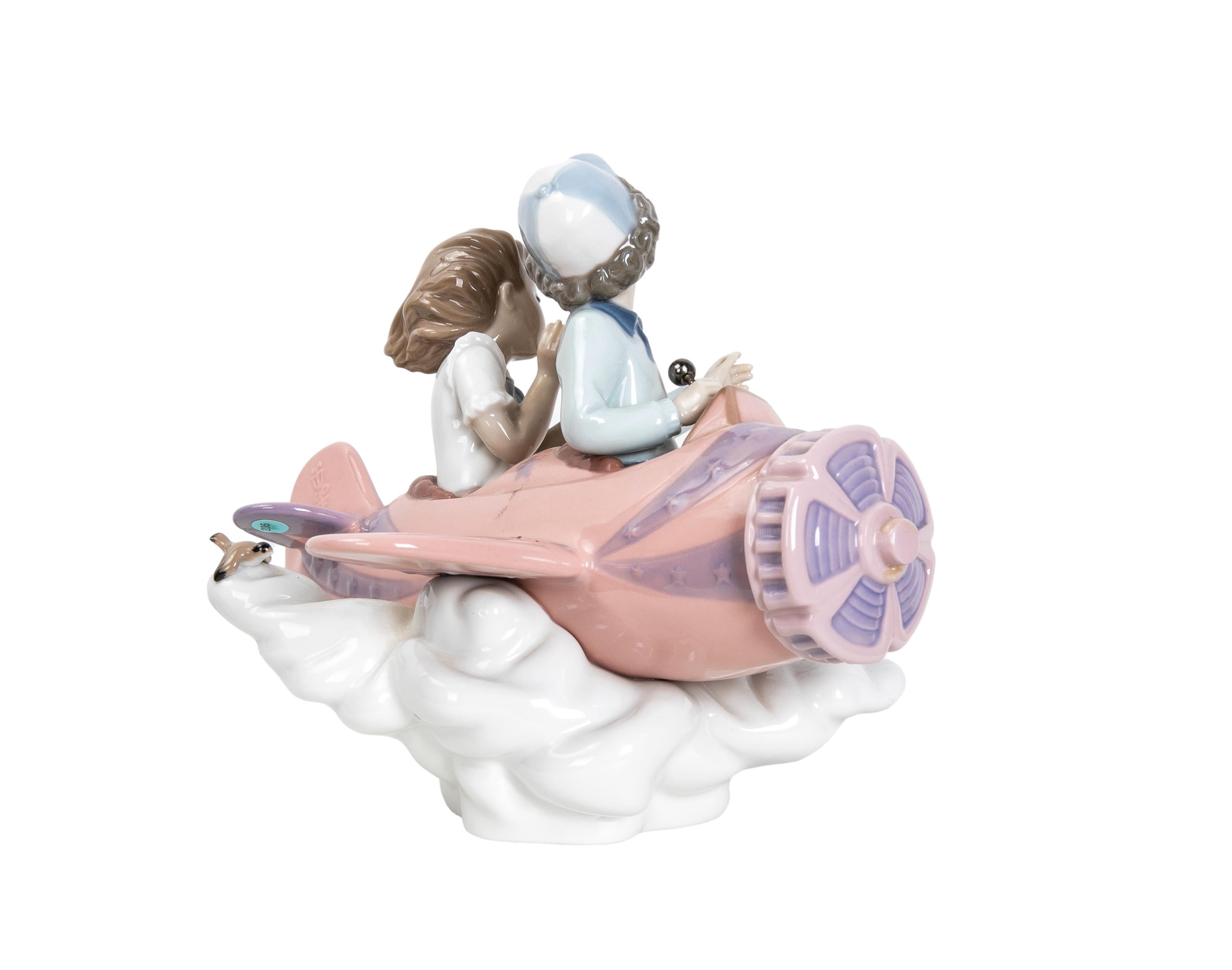 1989 Porcelain Figure of Children in Airplane Signed by the House of LLadró For Sale 1