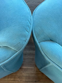 1989 Teal Swivel Chairs and an ottoman