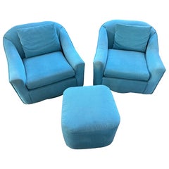 1989 Teal Swivel Chairs and an ottoman