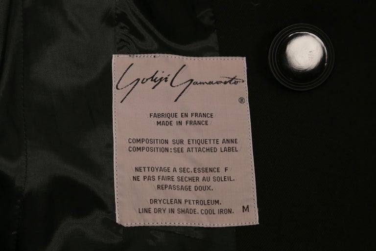 1989 YOHJI YAMAMOTO black runway coat with button detail For