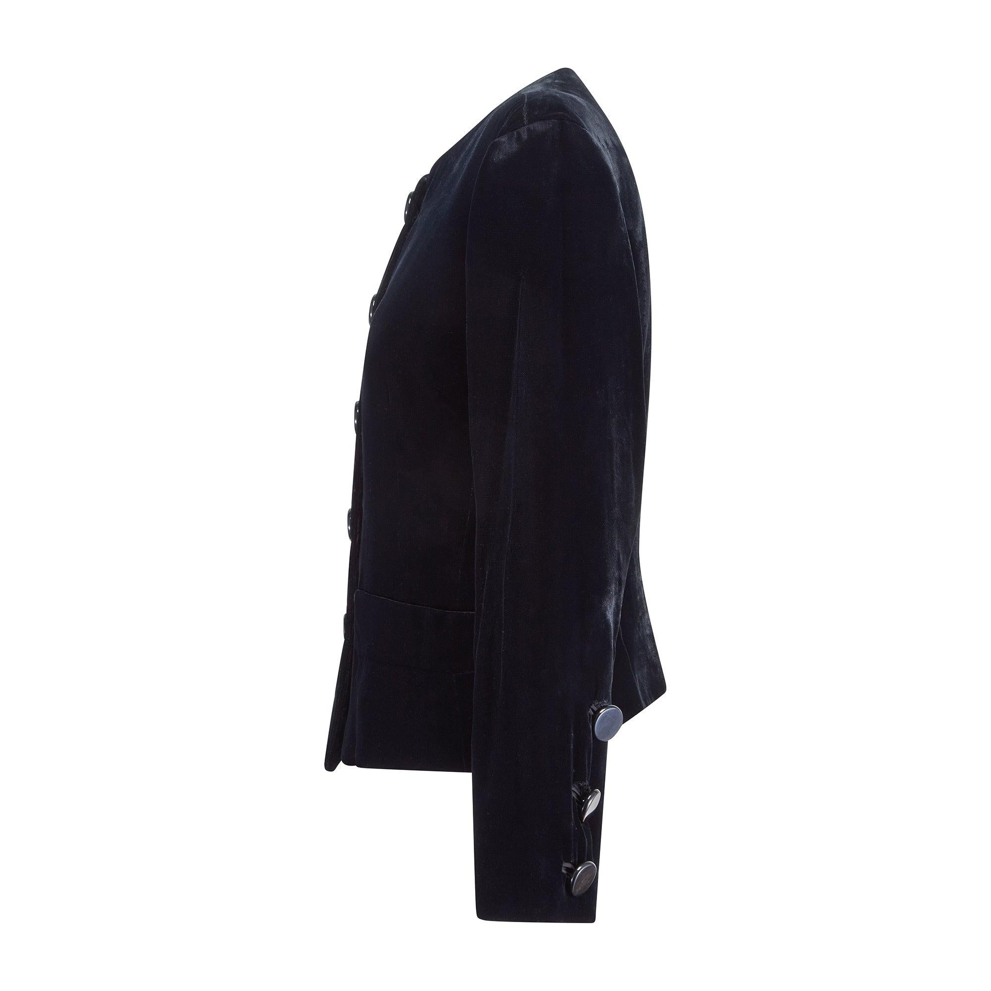 This elegant Yves Saint Laurent jacket is from the Rive Gauche Fall / Winter 1989 collection. Made in France, it is crafted from buttery soft black velvet. Showcasing the label’s tailoring know-how, it has a panelled construction and is cut to a