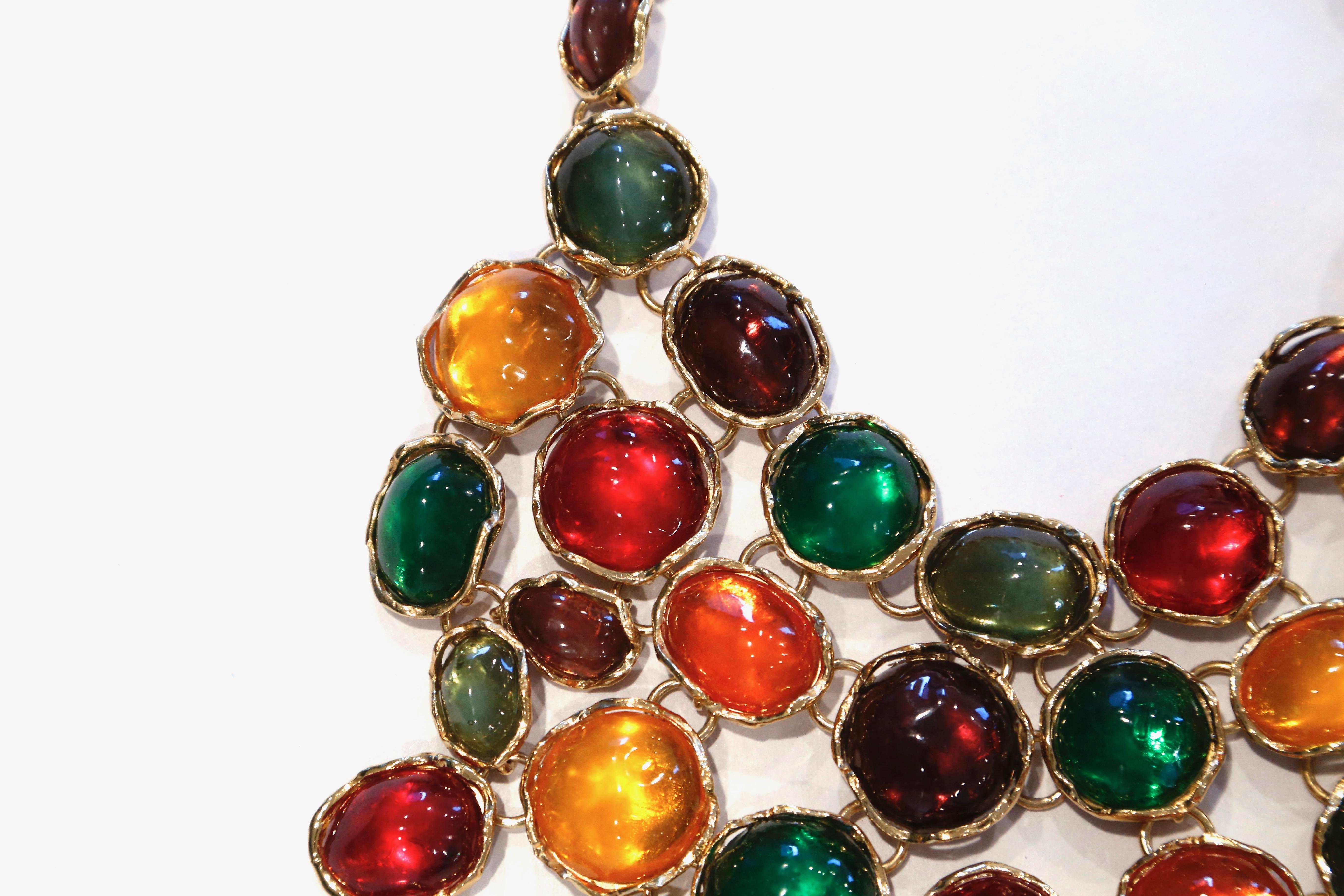 Dramatic, oversized, poured glass, bib necklace designed by Loulou de la Falaise for Yves saint Laurent dating to 1989 as featured on the haute couture runway. Necklace features multi-color poured glass set in gold-gilt metal. Adjustable hook