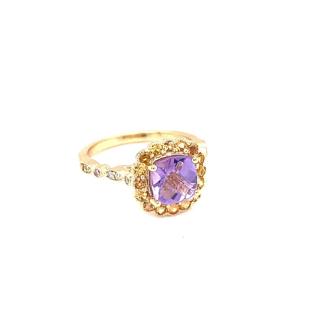1.99 Carat Cushion Cut Amethyst Diamond Sapphire 14K Yellow Gold Ring

This cute and dainty ring is great for everyday wear!!  It has a 1.35 carat Cushion Cut Amethyst and is surrounded by 16 Round Cut Yellow Sapphires that weigh 0.52 carats and 12