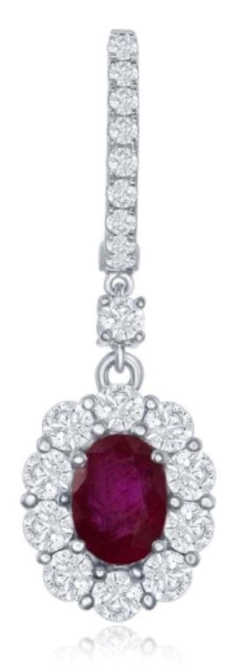 Beautiful drop style earrings articulate gently in the with light movement to throw brilliance and beauty in all directions. The two oval brilliant rubies total 1.99ct and there are 1.88 ct of accenting round brilliant cut diamonds. These are