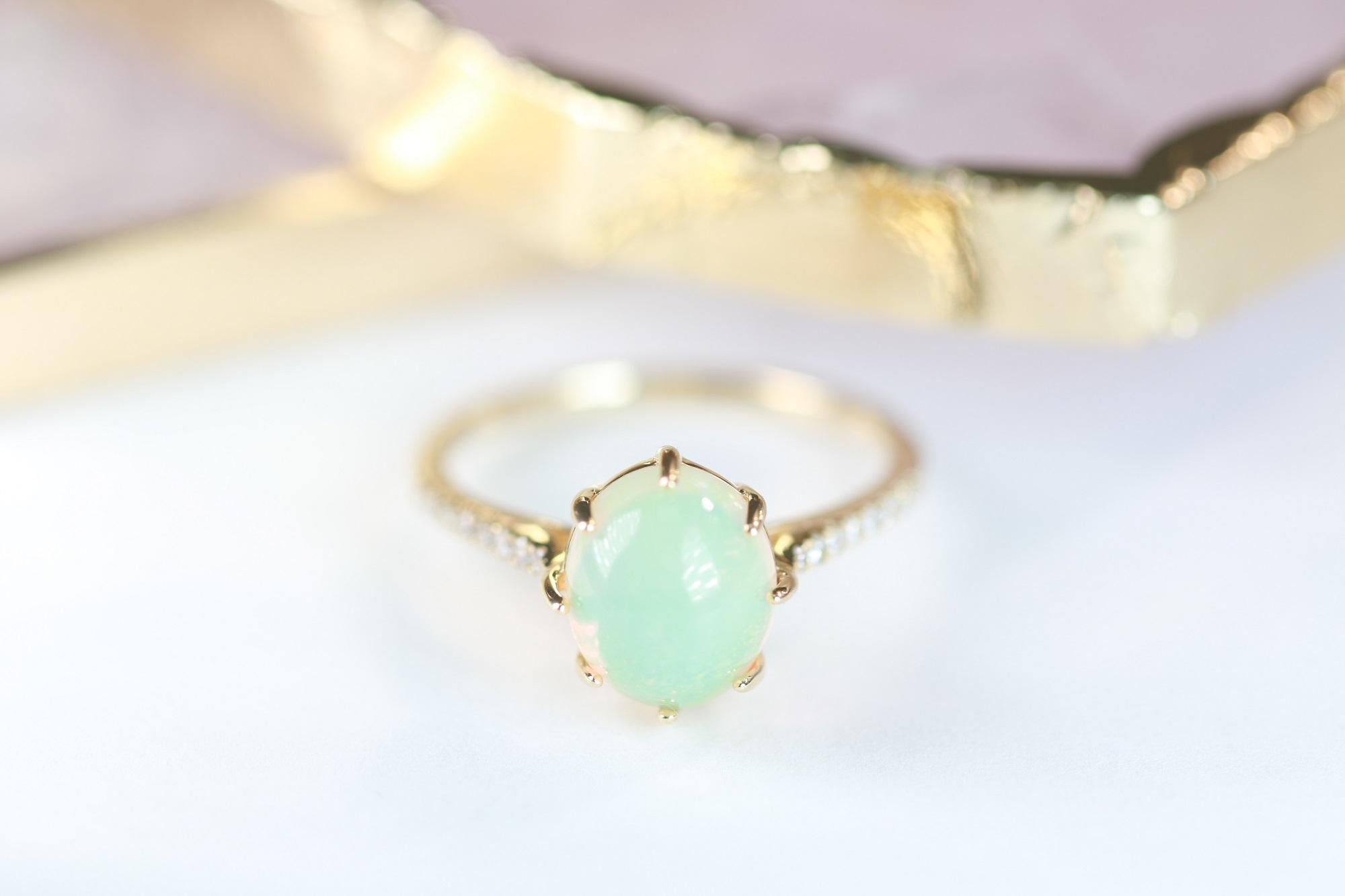Stunning, timeless and classy eternity Unique Ring. Decorate yourself in luxury with this Gin & Grace Ring. The 14k Yellow Gold jewelry boasts Oval Cab Prong Setting Genuine Ethiopian Opal (1 pcs) 1.99 Carat, along with Natural Round cut white