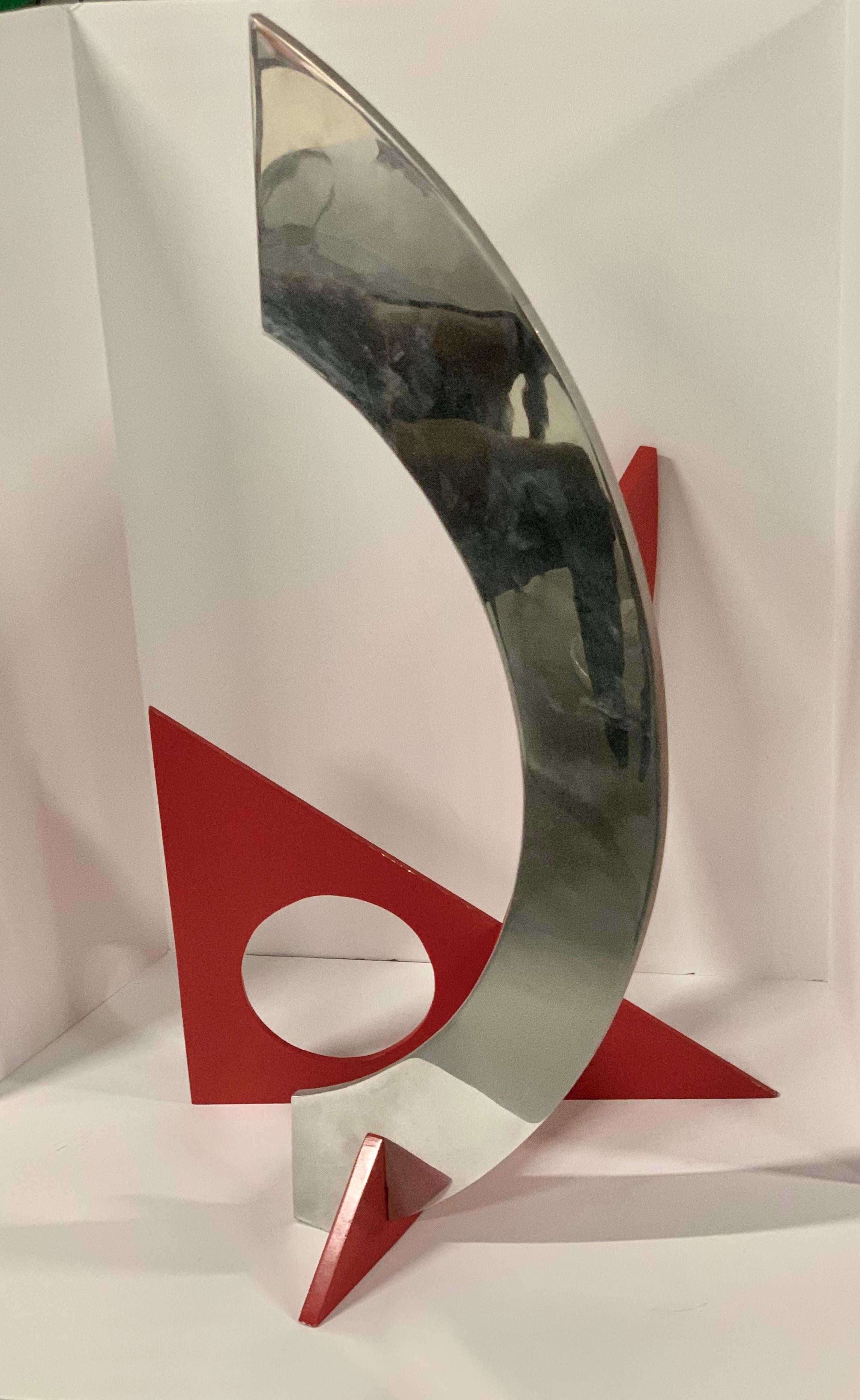 A painted aluminum sculpture by the noted American artist Frank Riggs (b. 1922). The piece is signed and dated 1990. In good condition with some minor paint loss along the edges and in some other spots. This sculpture can be used outdoors as it is