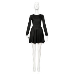 1990 AZZEDINE ALAIA black seamed mini dress with full skirt