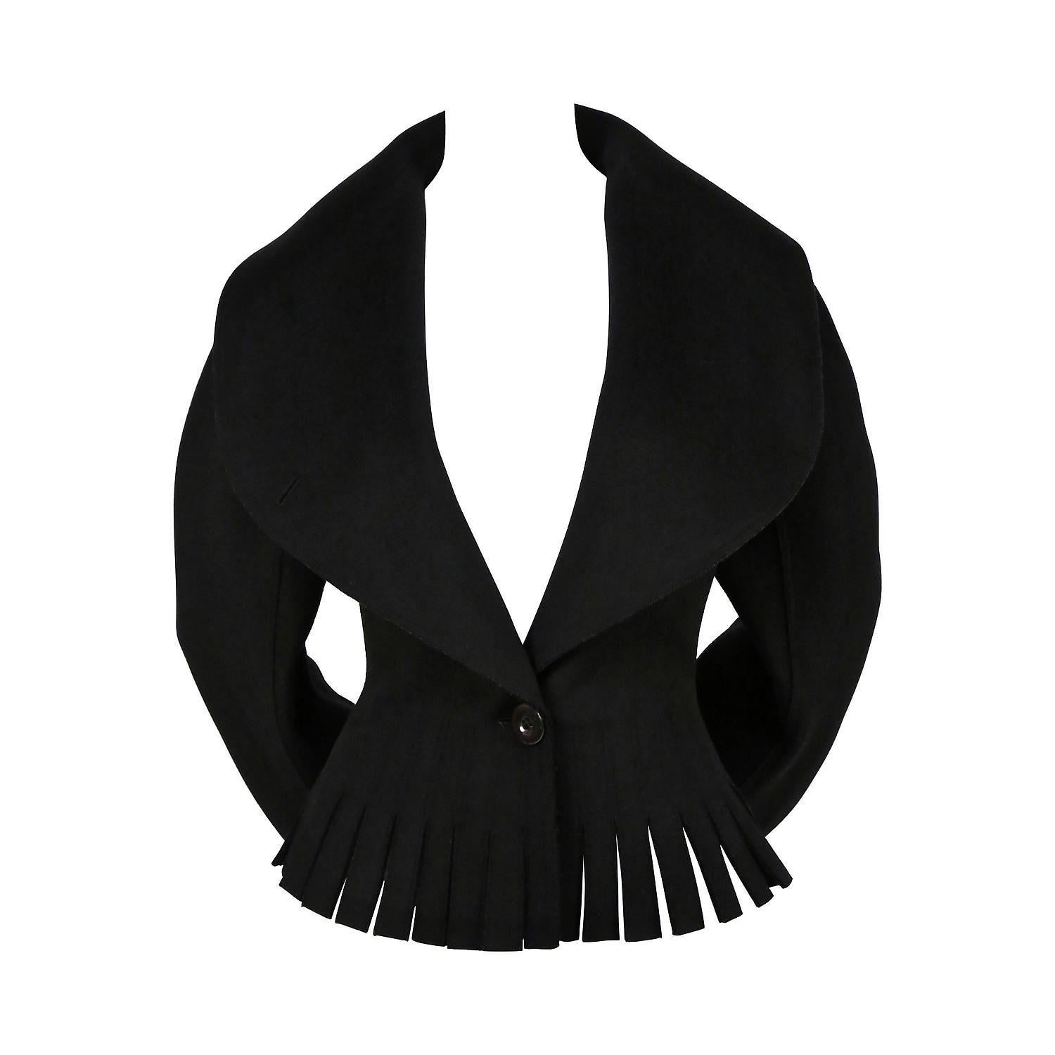 Gorgeous Azzedine Alaia jet-black wool jacket dating back to his 1990 collection. In the 1980's, when most of the fashion world was embracing sharp shouldered power dressing and baggy androgyny, Alaïa introduced the world to the 'body' and to his