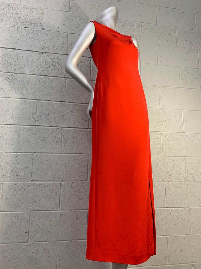 1990s Bill Blass Persimmon Silk Crepe Column Gown w Asymmetrical Neckline Detail: Elegant, long and lean this classic American Beauty features a side slit and back zipper and is fully lined. Marked US size 8.