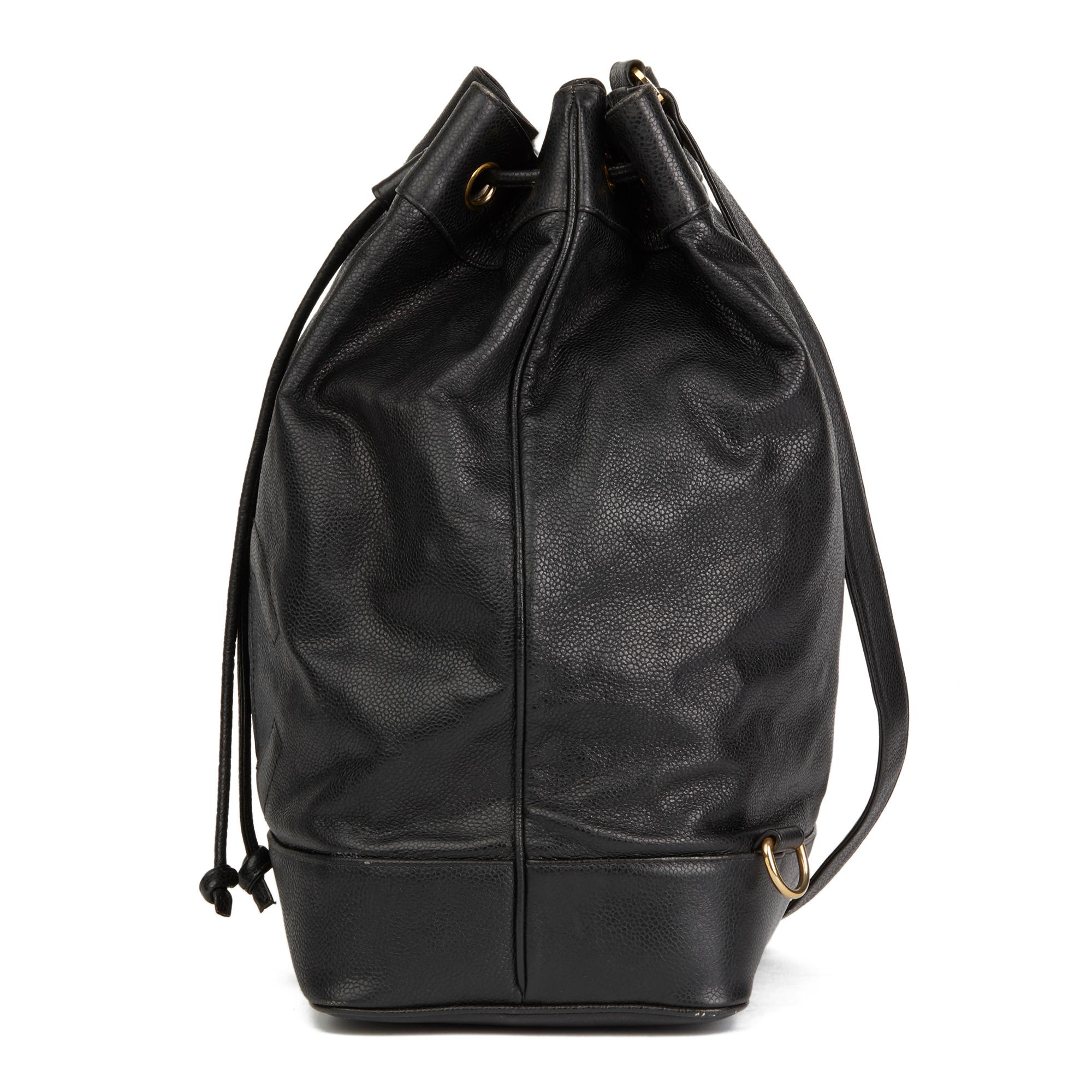 CHANEL
Black Caviar Leather Vintage Timeless Single Strap Backpack

Reference: HB2489
Serial Number: 1960204
Age (Circa): 1990
Accompanied By: Interior Pouch
Authenticity Details: Serial Sticker (Made in Italy)
Gender: Ladies
Type: Shoulder,