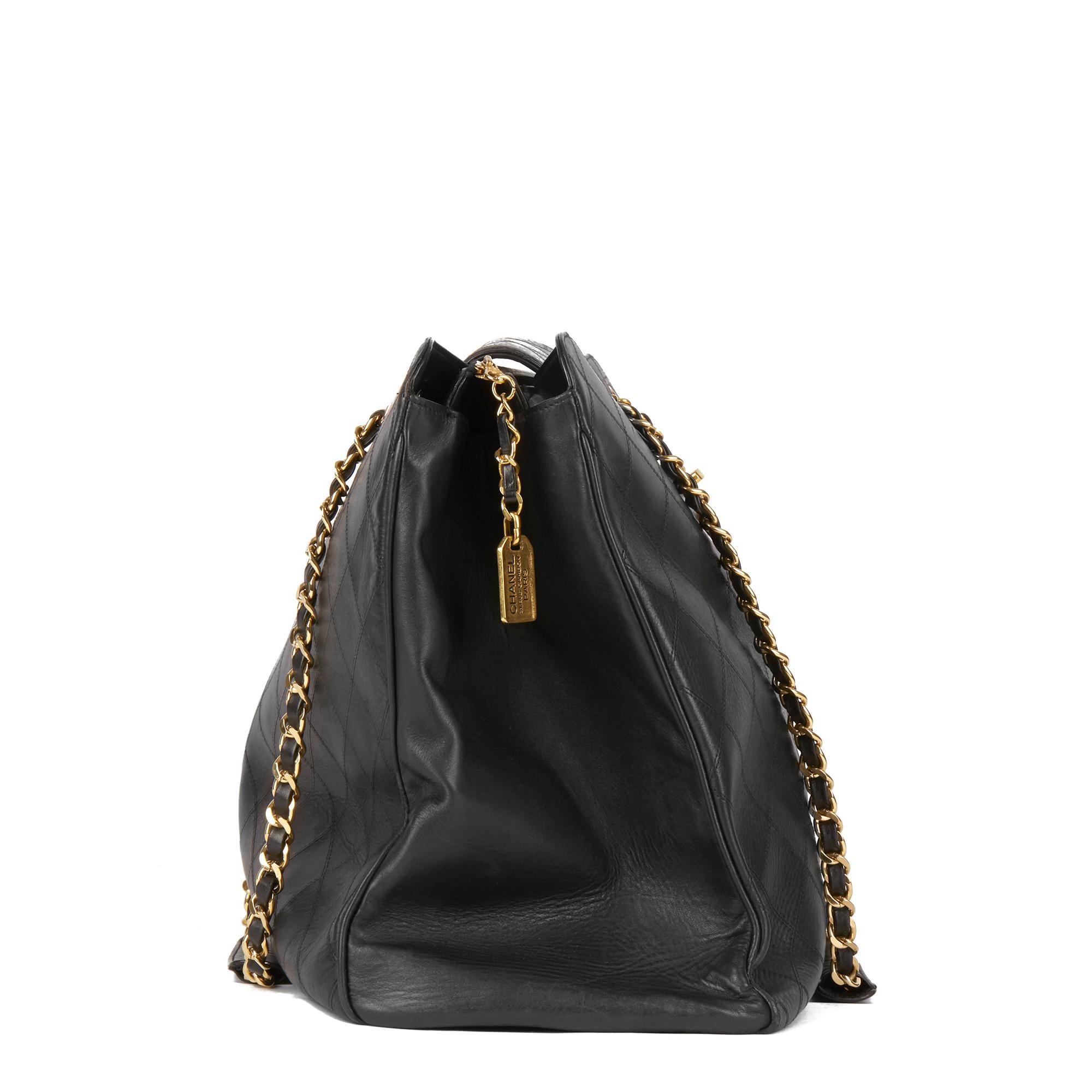 CHANEL
Black Quilted Lambskin Leather Vintage Jumbo XL Supermodel Tote

Xupes Reference: HB2948
Serial Number: Serial Sticker no longer readable
Age (Circa): 1990
Authenticity Details: Serial Sticker (Made in Italy)
Gender: Ladies
Type: Shoulder,