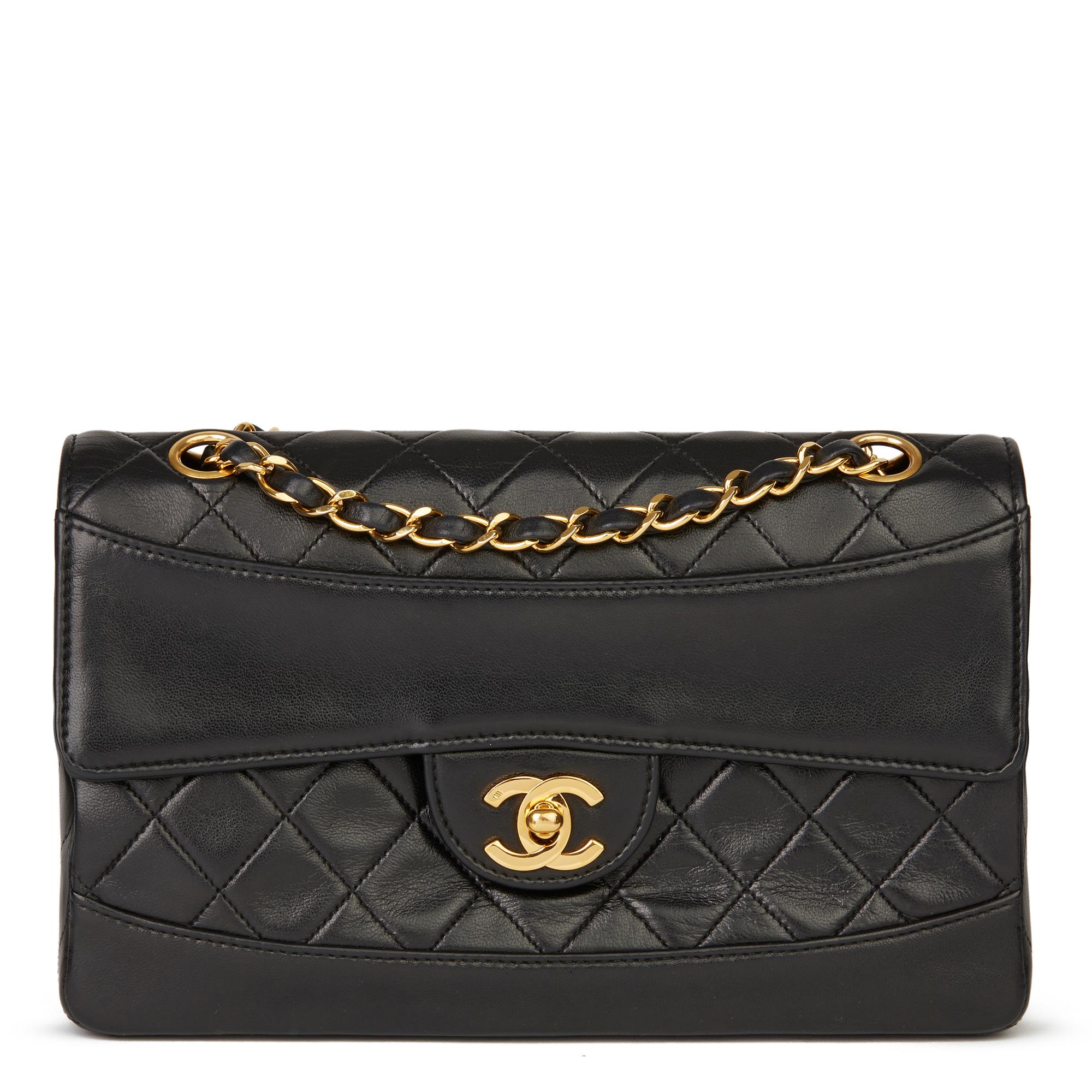 CHANEL
Black Quilted Lambskin Vintage Classic Single Flap Bag with Wallet

Reference: HB2823
Serial Number: 1610107
Age (Circa): 1990
Accompanied By: Chanel Dust Bag, Box, Authenticity Card, Interior Wallet
Authenticity Details: Serial Sticker,