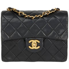 1990 Chanel Black Quilted Lambskin Vintage Mini Flap Bag