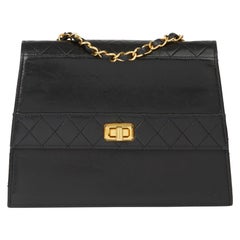 1990 Chanel Black Quilted Lambskin Vintage Trapeze Classic Single Flap Bag 