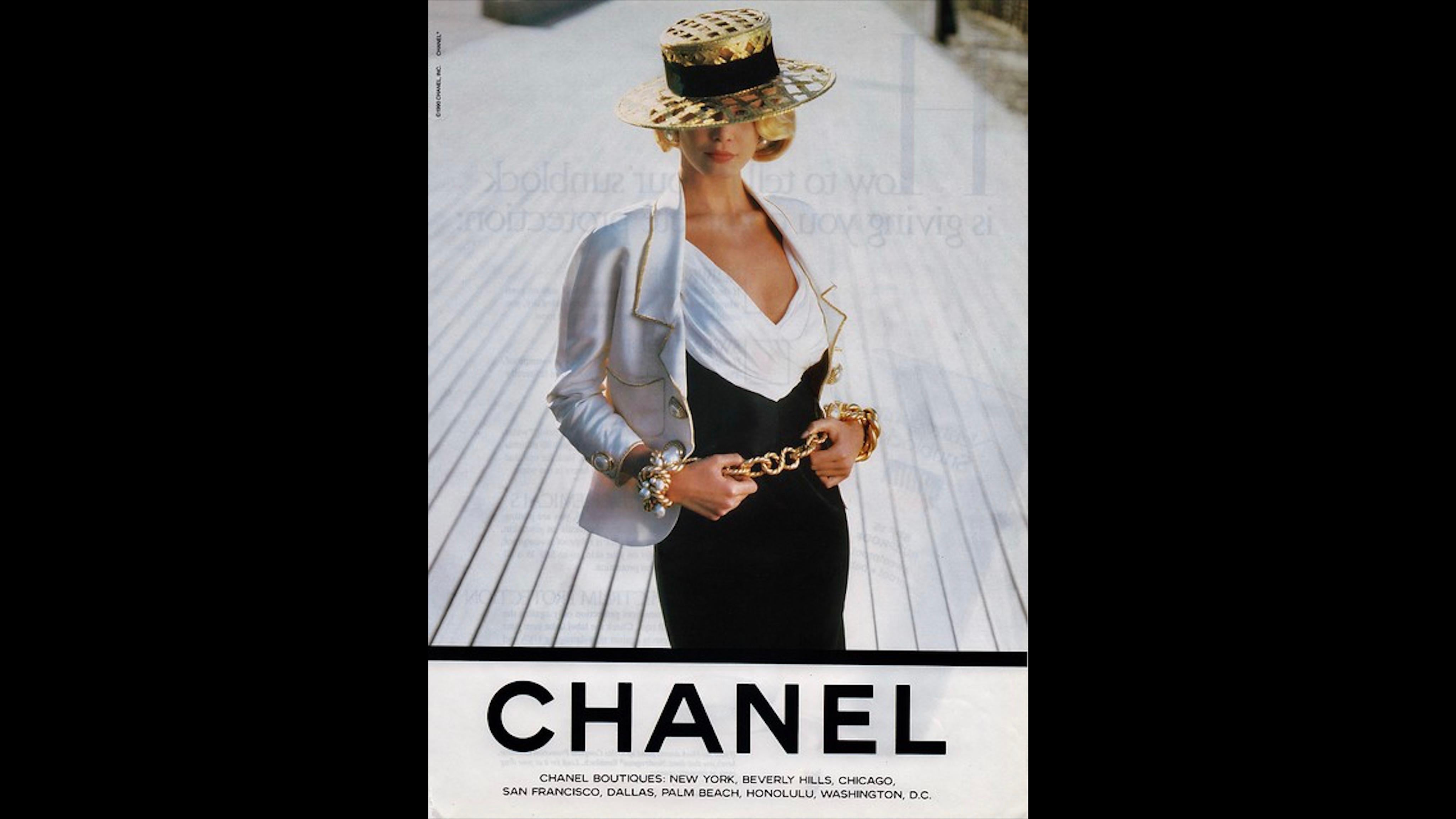 The 1990 Chanel Runway Gold Lattice Ad Campaign Hat stands as an unrivaled piece of fashion history that epitomizes luxury and craftsmanship. This iconic and rare hat features a stunning see-through woven design that blends elegance and artistry,