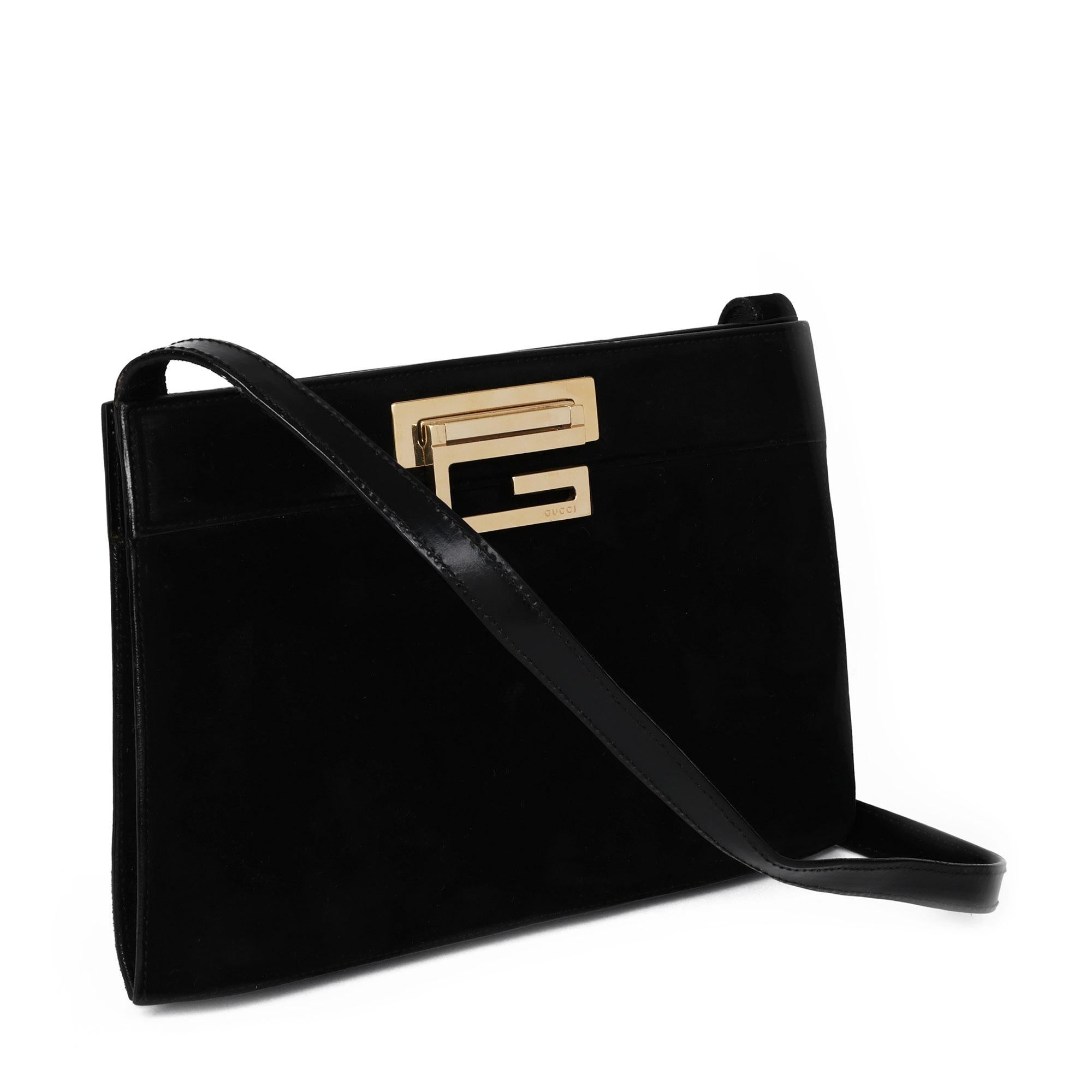 GUCCI
Black Suede Vintage Frame Shoulder Bag

Xupes Reference: CWAHF-HB007
Serial Number: 001-1781-1864
Age (Circa): 1990
Authenticity Details: Date Stamp (Made in Italy)
Gender: Ladies
Type: Shoulder

Colour: Black
Hardware: Gold
Material(s):