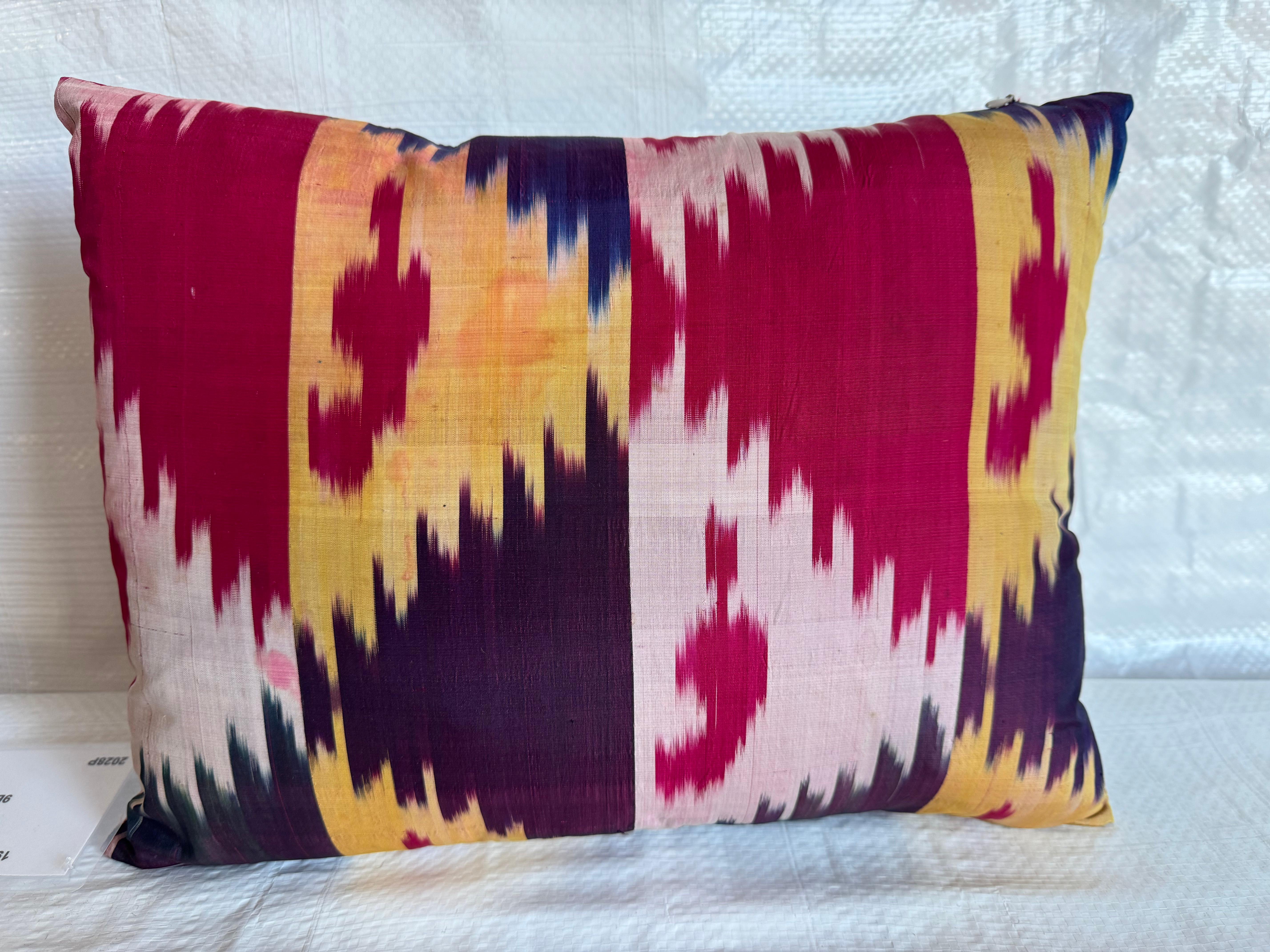Embrace the vintage allure with the 1990 Ikat Pillow, measuring 15