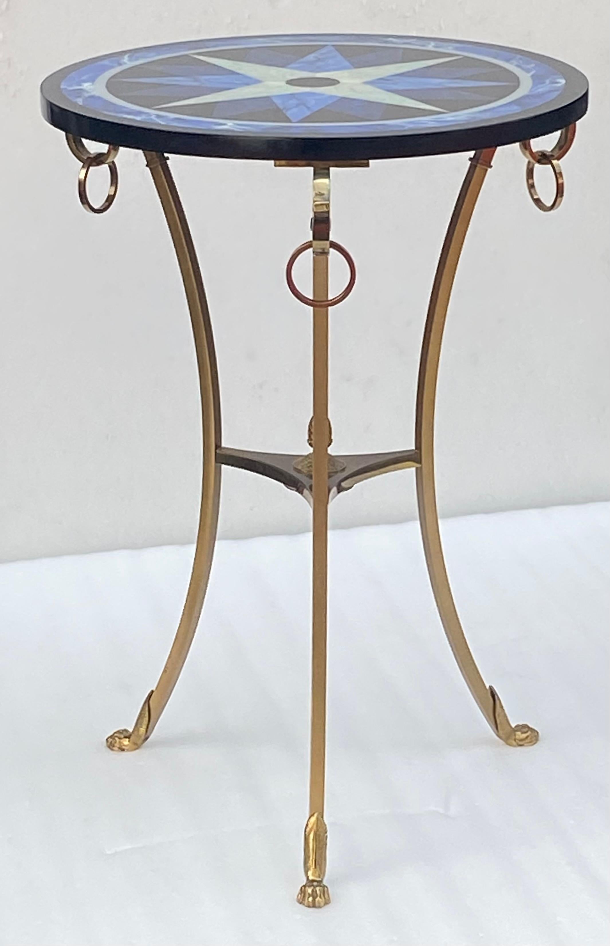 Maison Charles bronze tripod pedestal table with “Star” model resin top with geometric patterns, doe feet and rings.
Spacer decorated with a pine cone
Circa 1990. Good condition.
Model by Chrystiane Charles acquired in her gallery.
Height: 71