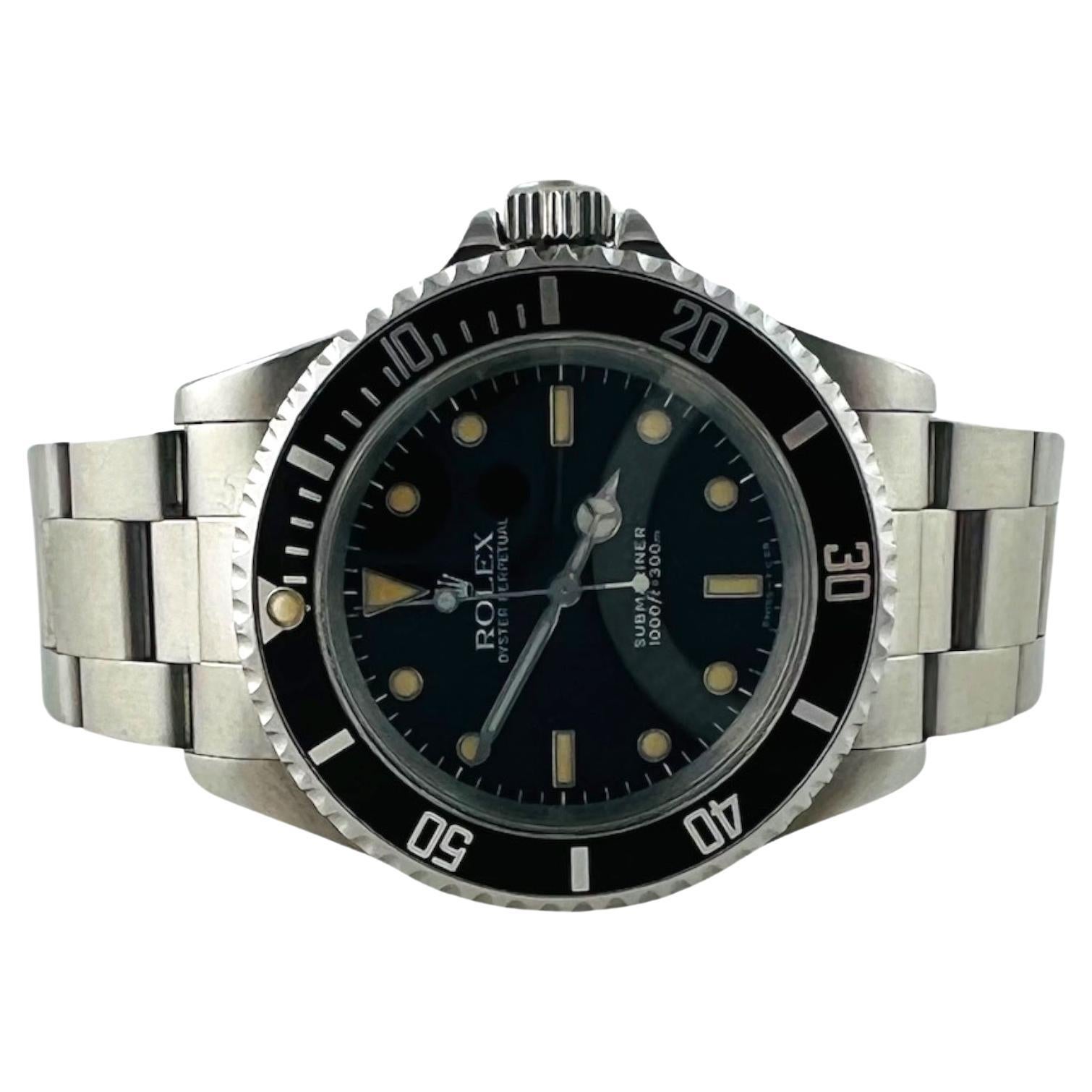 Rolex's Men's Submariner Watch

Model: 14060
Serial: E715498

This classic Rolex submariner with a black dial and black bezel is from 1990

Automatic movement

Stainless steel oyster band - fits up to 7.5