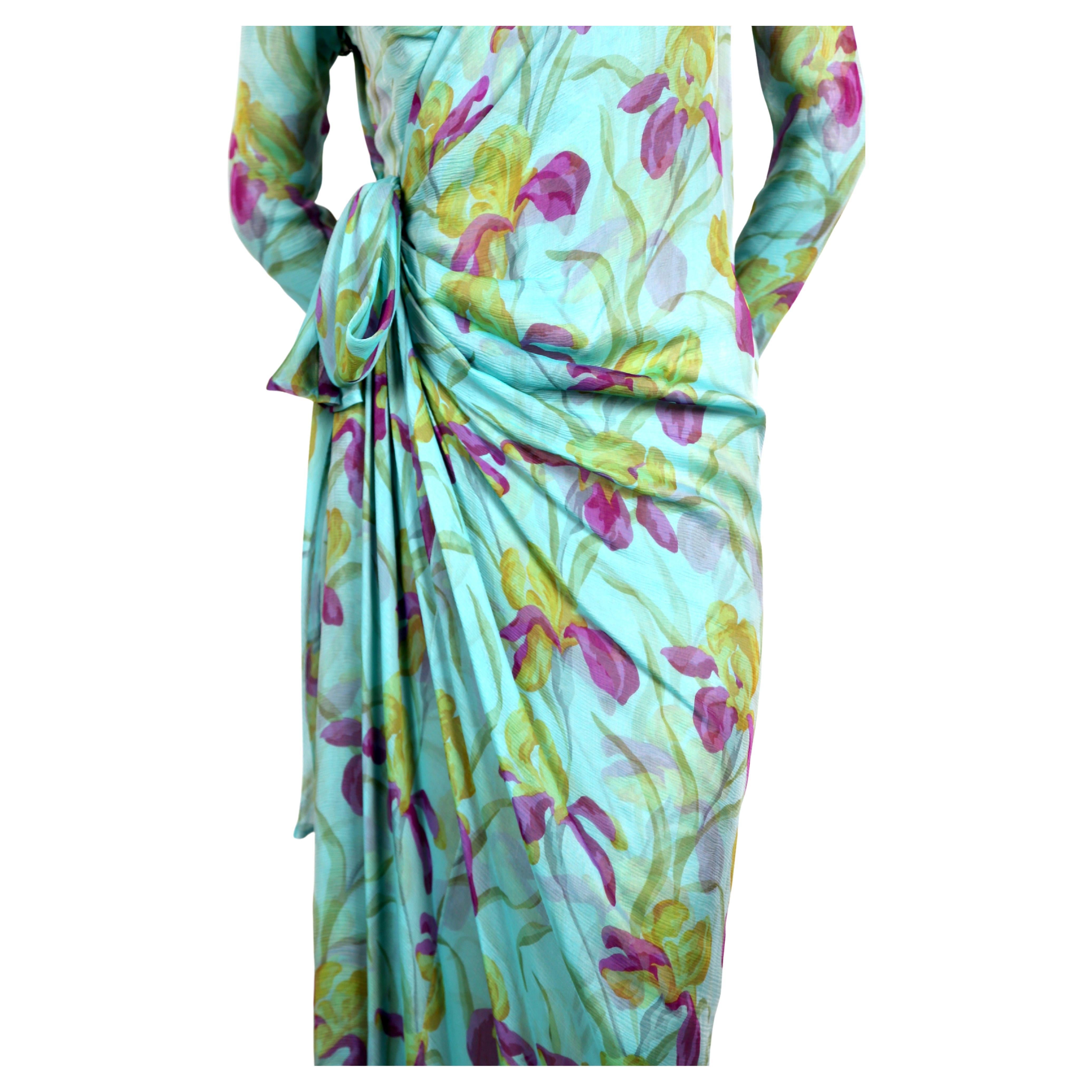 Very rare, floral-printed, silk mousseline, haute couture dress designed by Yves Saint Laurent dating to 1990 as seen on the spring couture runway in a different print. Dress best fits a size 4-6. Approximate measurements: shoulders 15