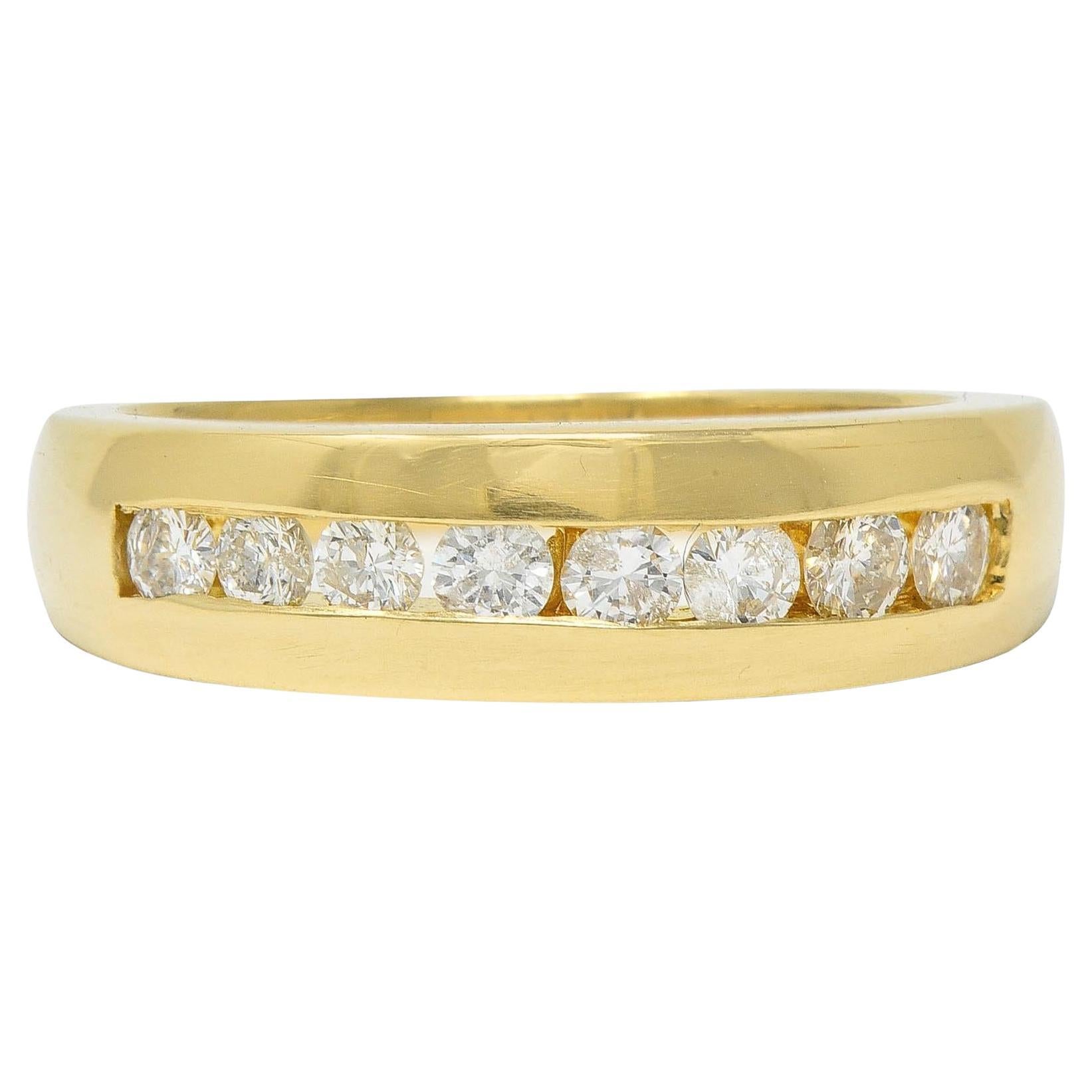 1990's 0.48 CTW Diamond 14 Karat Yellow Gold Vintage Channel Band Ring